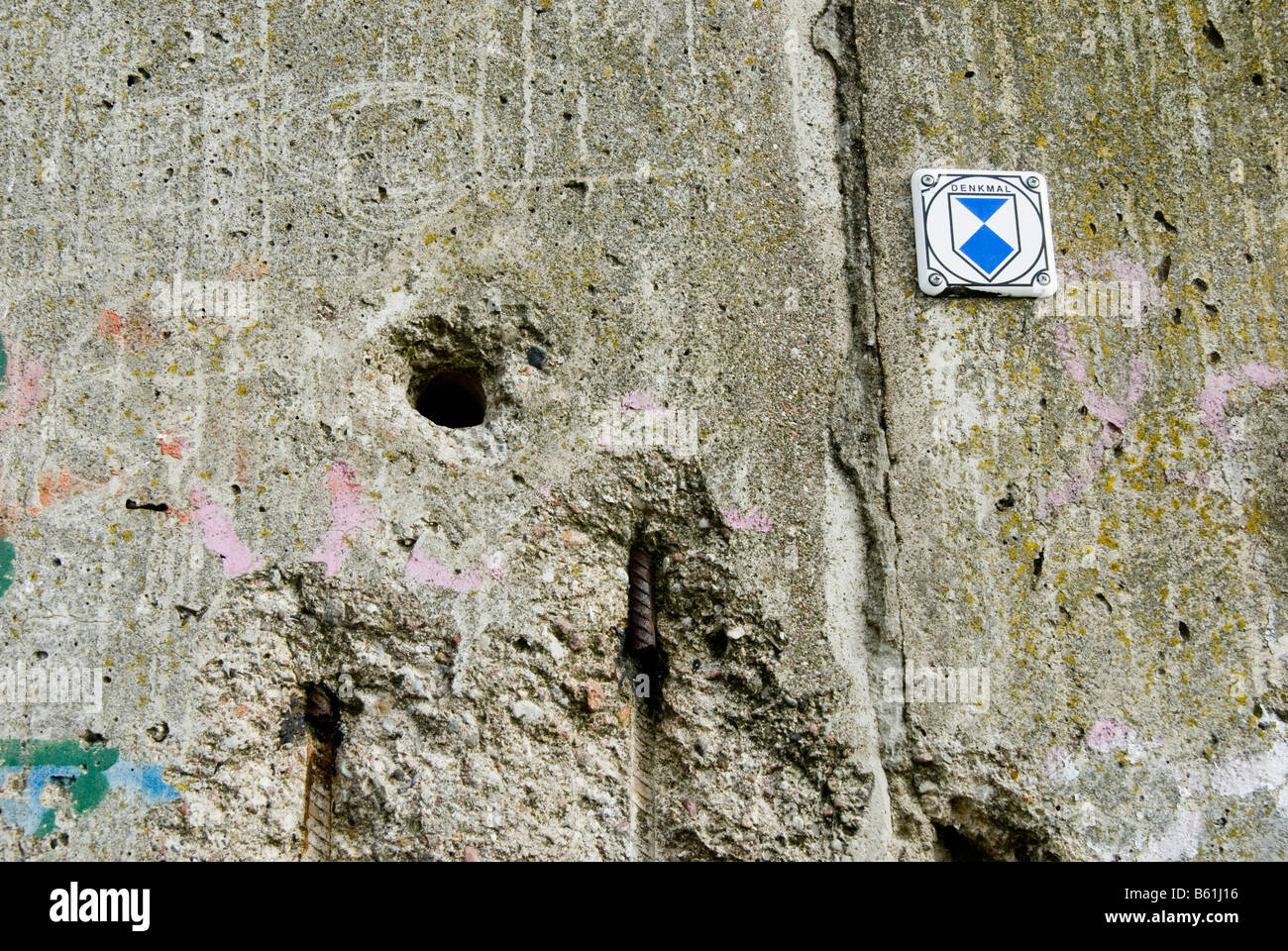 Protected monument sign, Berlin Wall in Bennauer Strasse, part of the