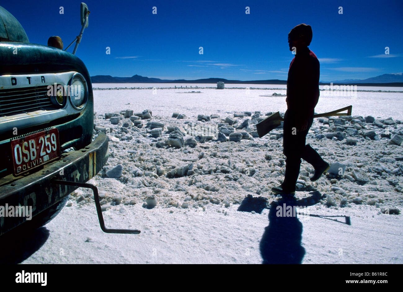 After three days of work in the Uyuni salt flat Inocencio Flores  back to Colchani in his truck. Bolivia. Stock Photo