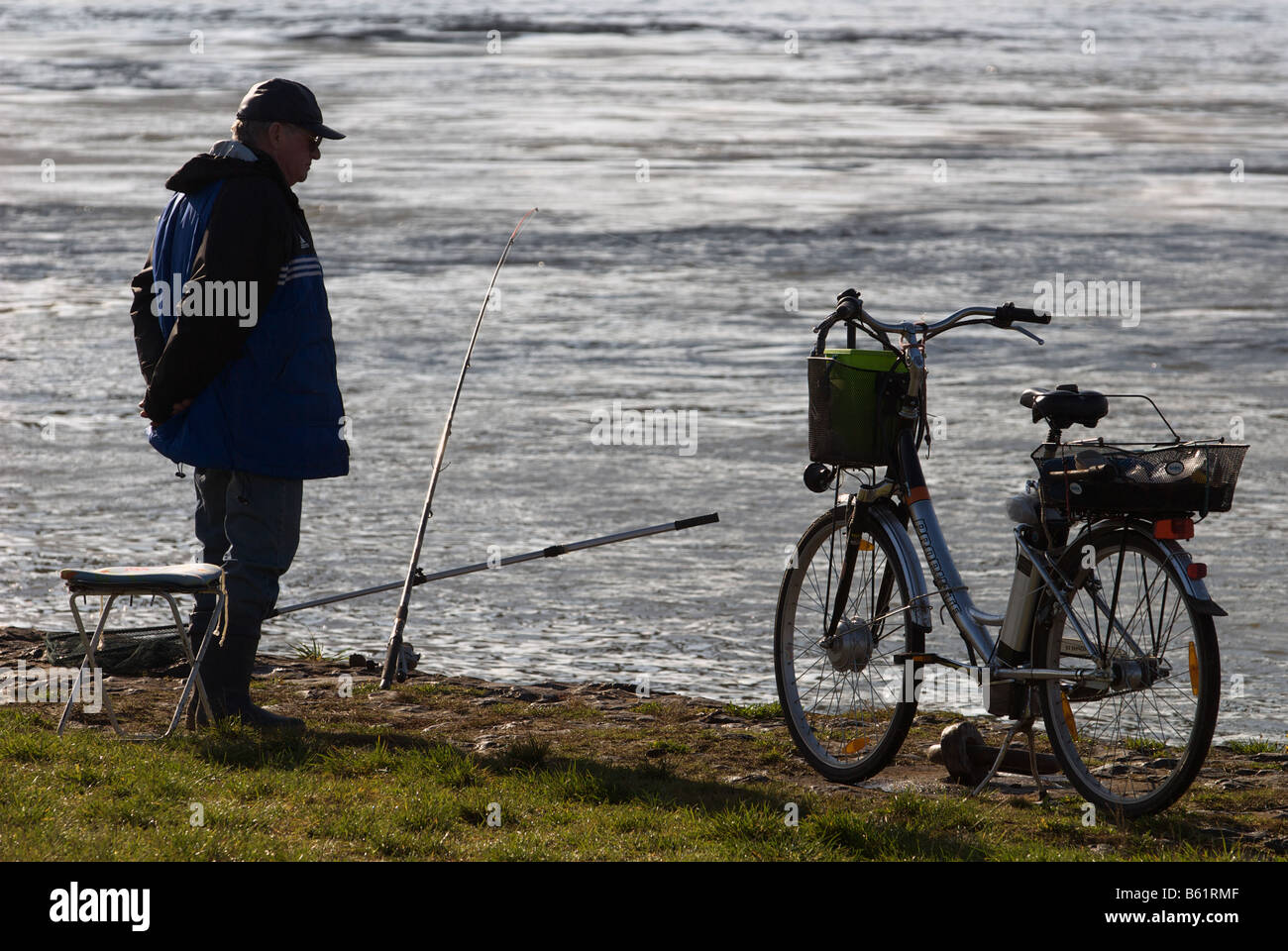 Angler Fishing In The River Rhine Cologne North Rhine Westphalia Germany Stock Photo Alamy