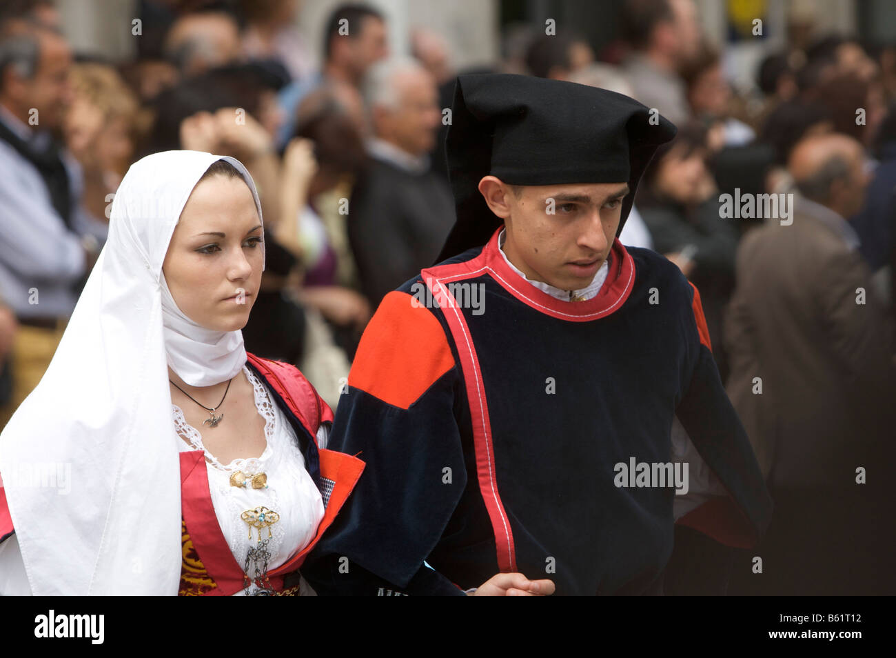 Couple wearing traditional costumes at Cavalcata Sarda Festival in Sassari, Sardinia, Italy, Europe Stock Photo