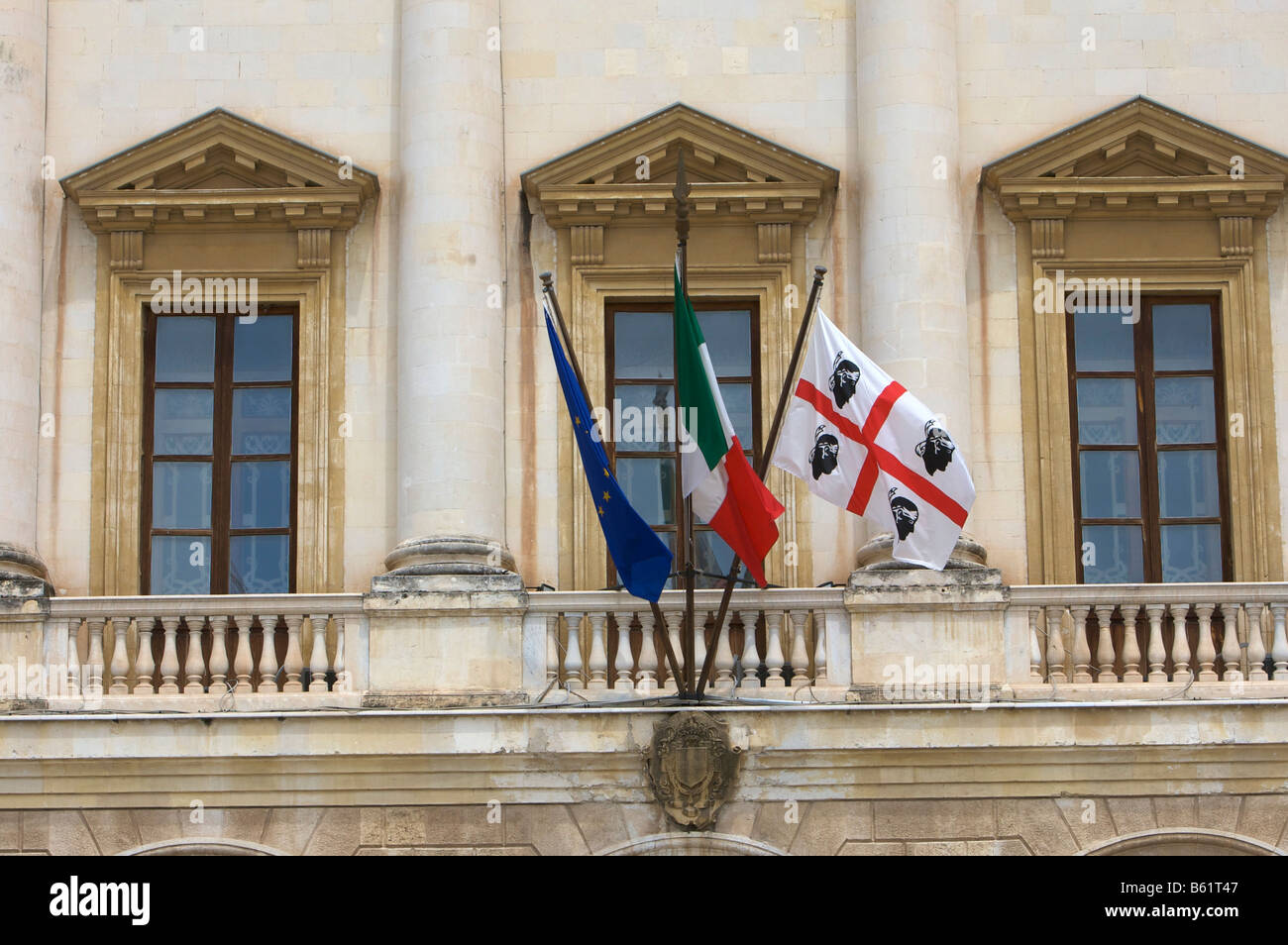 European, Italian and Sardinian flags on Palazzo della Provincia, Piazza Italia, Sassari, Sardinia, Italy, Europe Stock Photo