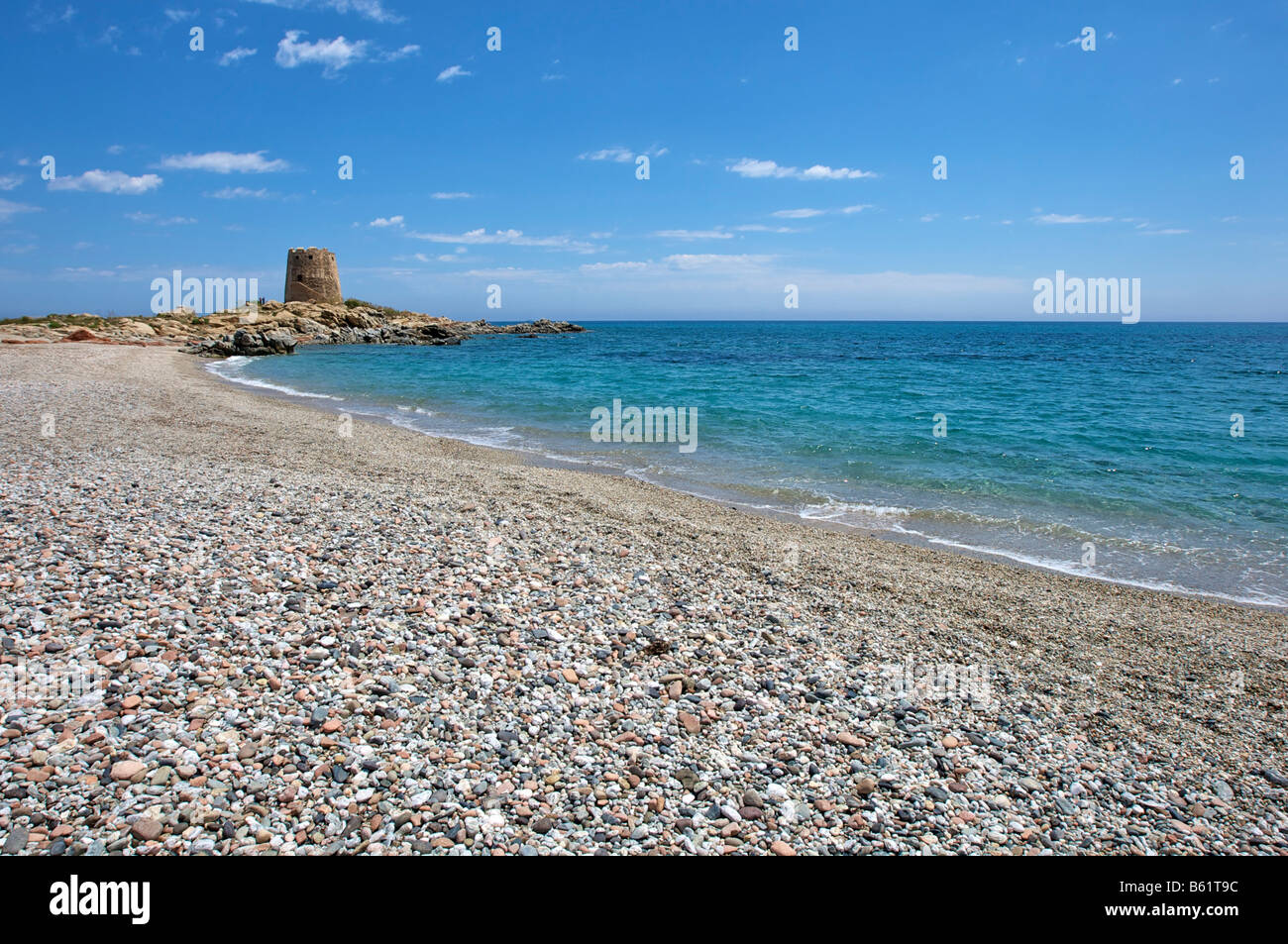 Gravel beach at Torre di Bari tower, Barisardo, Sardinia, Italy, Europe Stock Photo