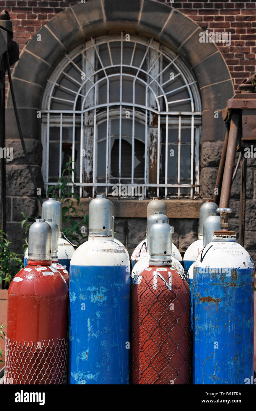 Compressed gas bottles with oxygen and acetylene for gas welding in