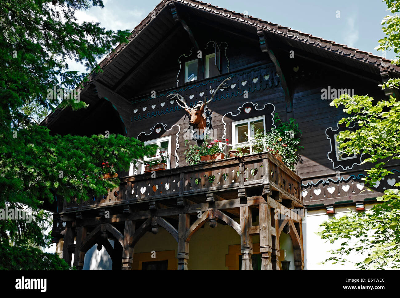 Historic villa with wooden veranda, alpine style, villa colony of Neubabelsberg, Potsdam-Babelsberg, Brandenburg, Germany, Euro Stock Photo