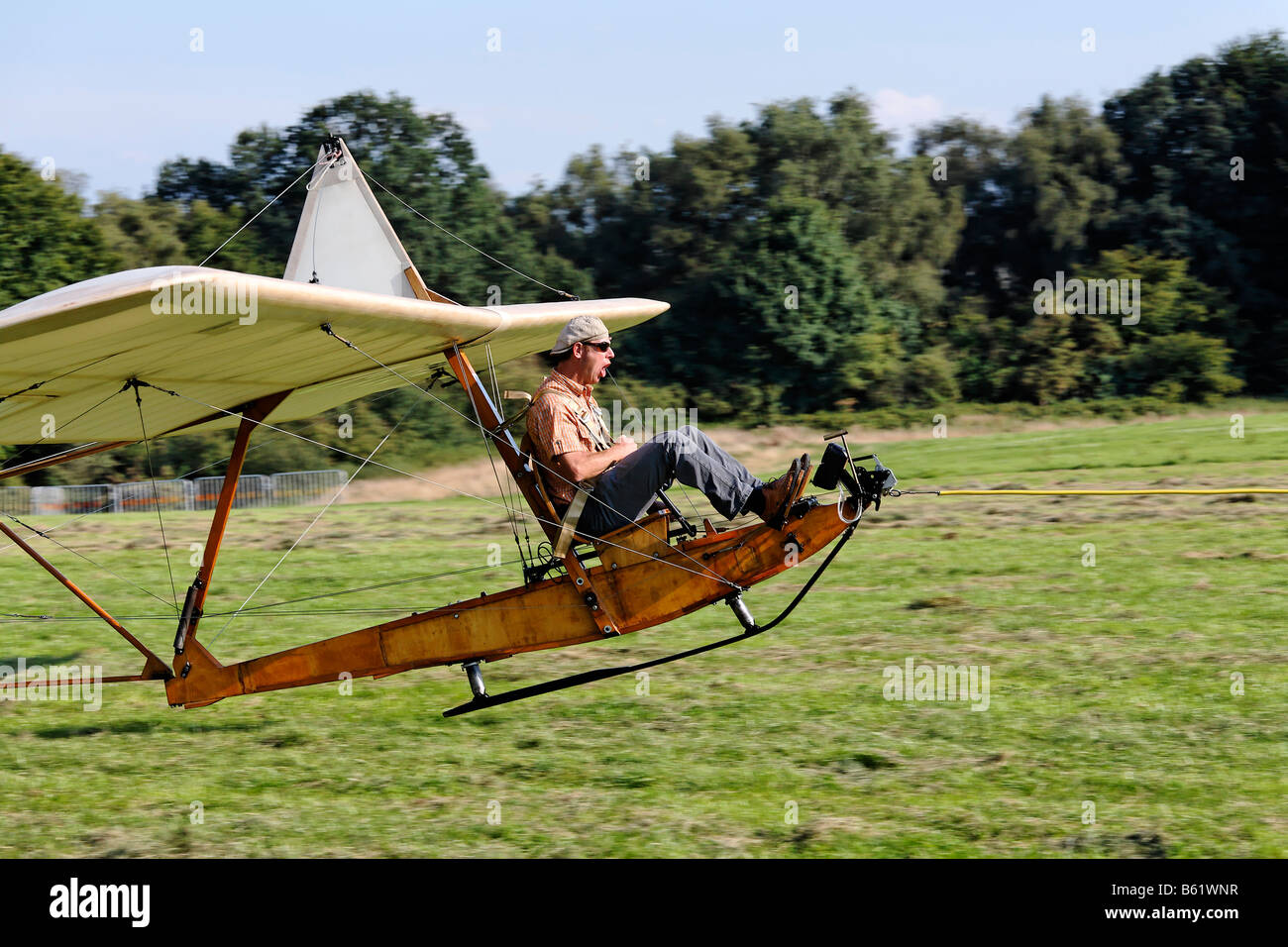 Historic glider SG38 being pulled on a cable into the air, wooden construction with an open seat, glider to train beginners fro Stock Photo
