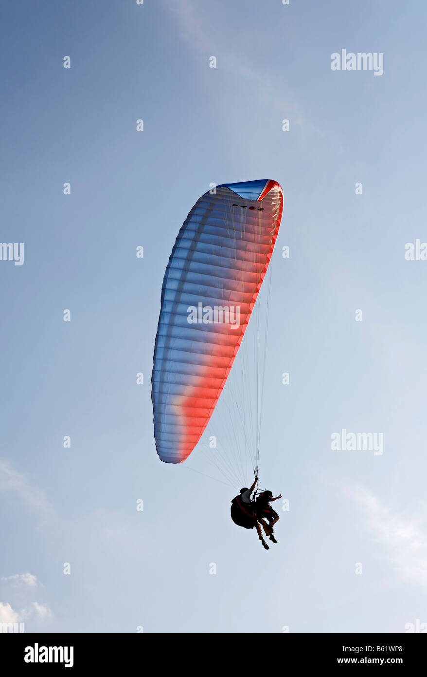 Man and boy hanging together on a paraglider, Air Show, Aero Club Duesseldorf, Nordrhein-Westfalen, Germany, Europe Stock Photo
