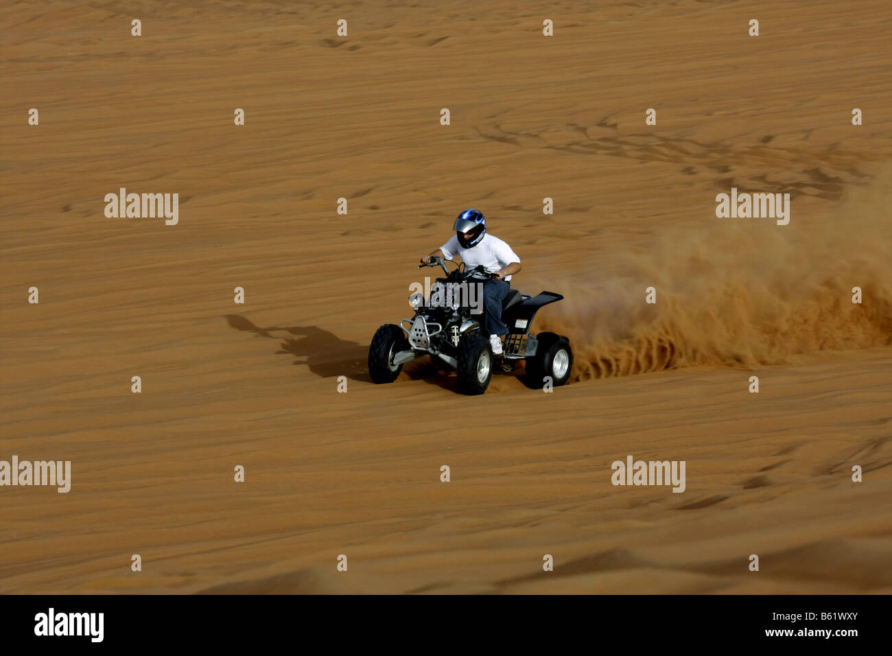 AN ATV AT THE DESERT SAFARI IN DUBAI Stock Photo - Alamy