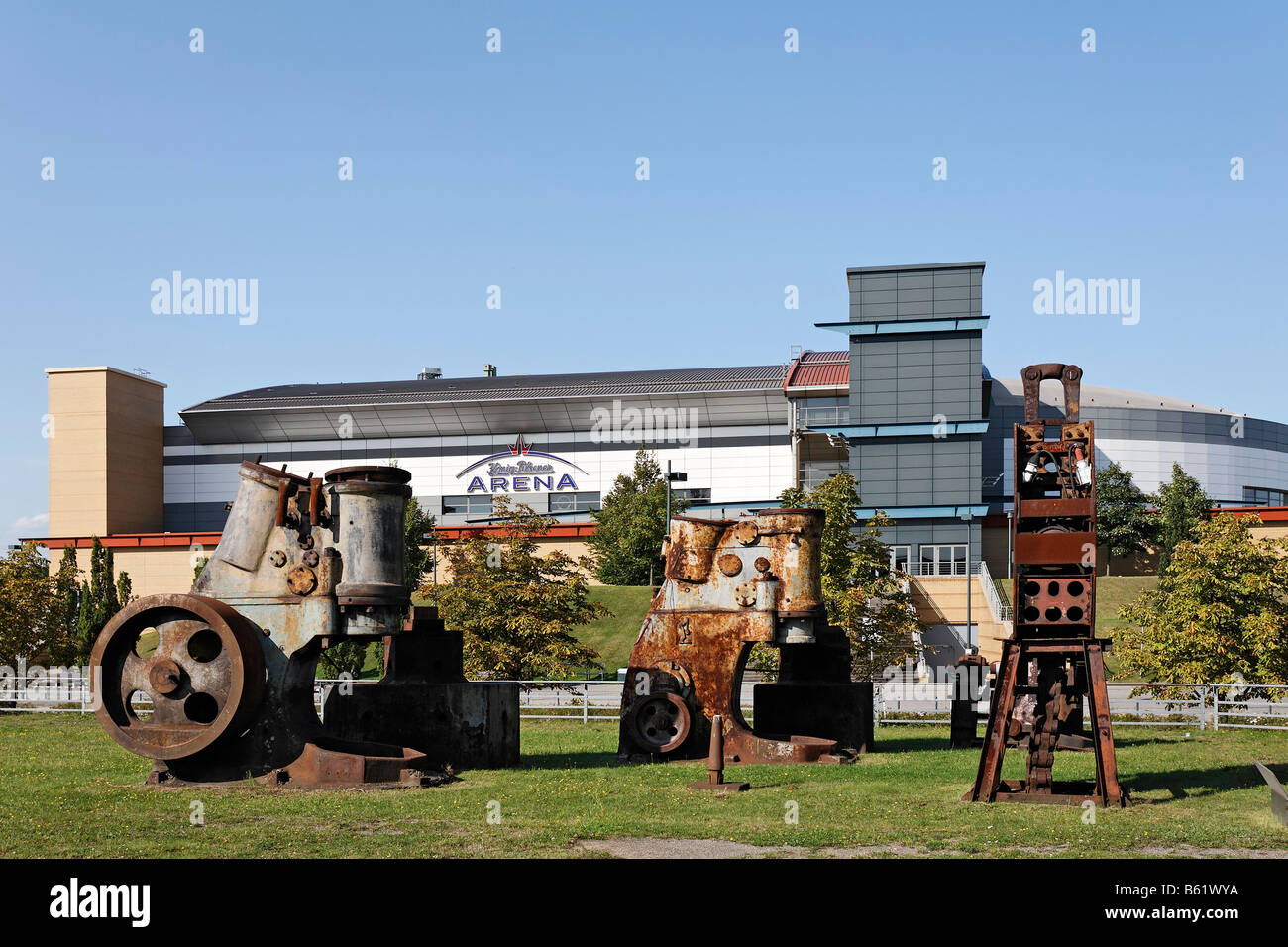 Rusty machine parts from an iron and steel works, open-air area of the Rhine Industrial Museum, bus and railway station Neue Mi Stock Photo