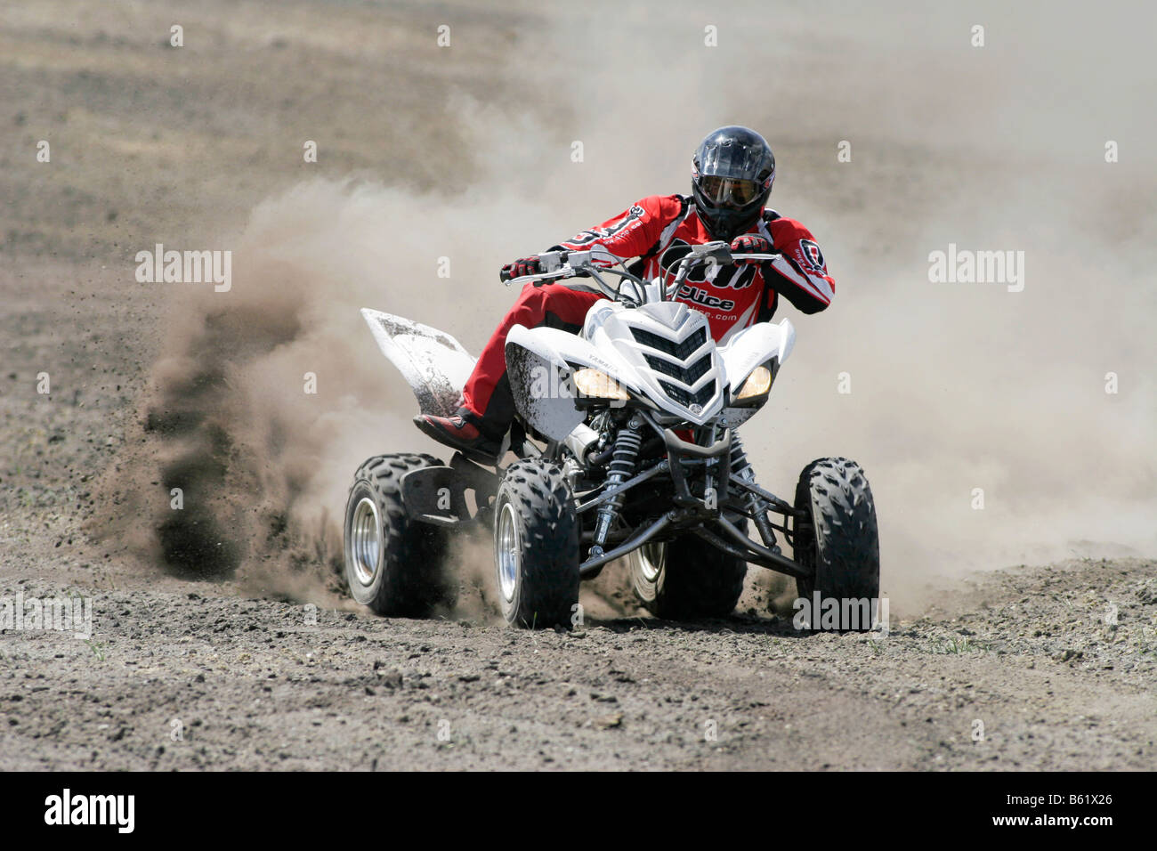 Yamaha Quad driving offroad Stock Photo Alamy