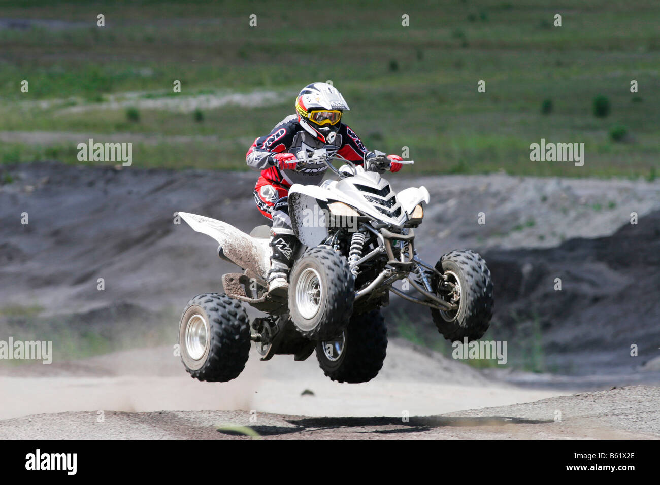 Yamaha Quad driving offroad Stock Photo Alamy