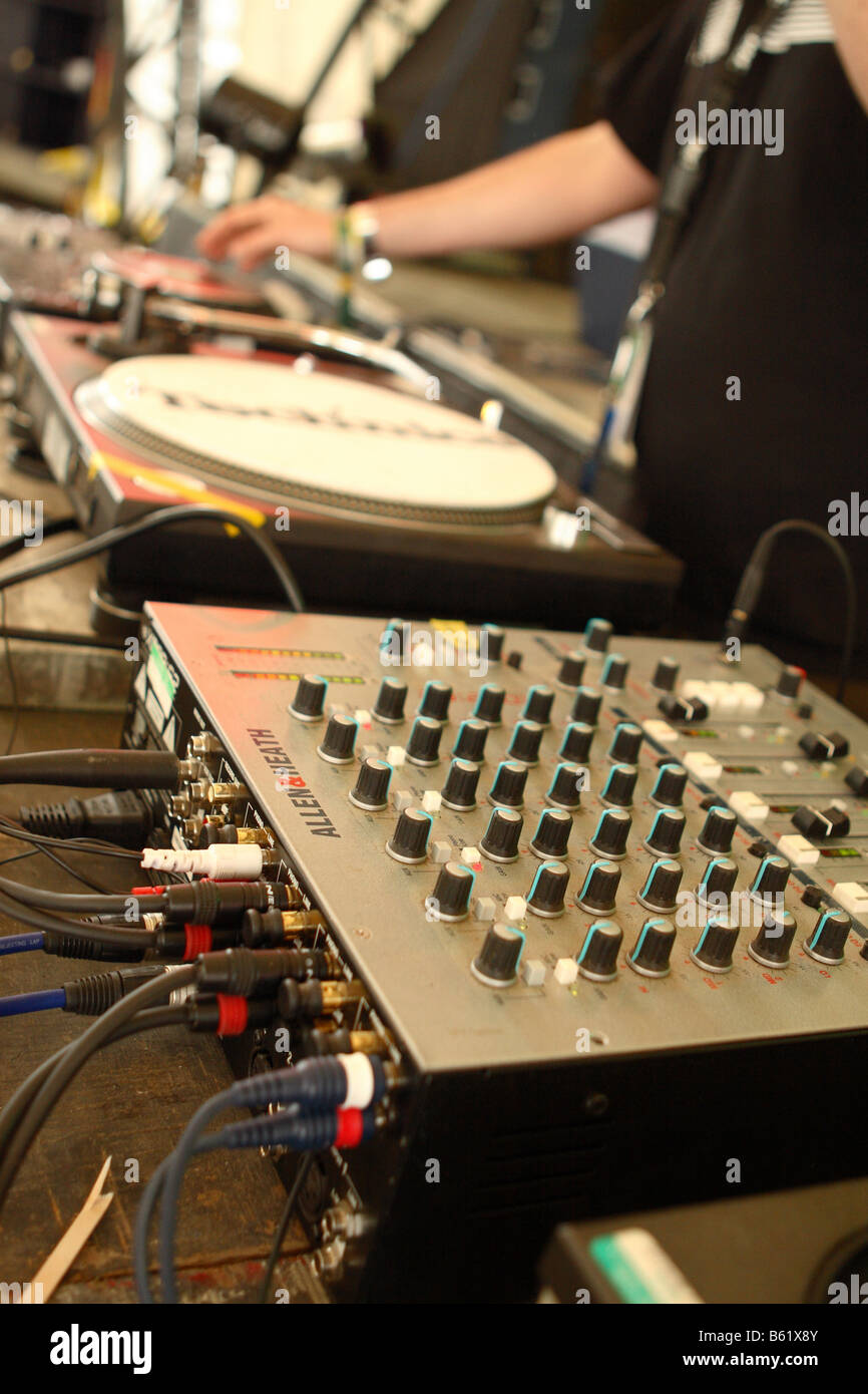 DJ sound mixing desk system at rave music pop concert gig Stock Photo