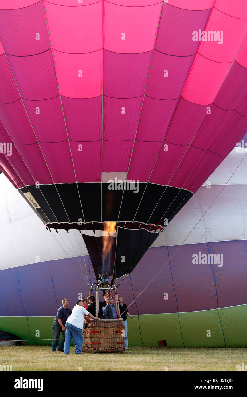 Hot-air balloon, take-off of the balloon, Bad Brueckenau, Rhoen Mountains, Lower Franconia, Bavaria, Germany, Europe Stock Photo