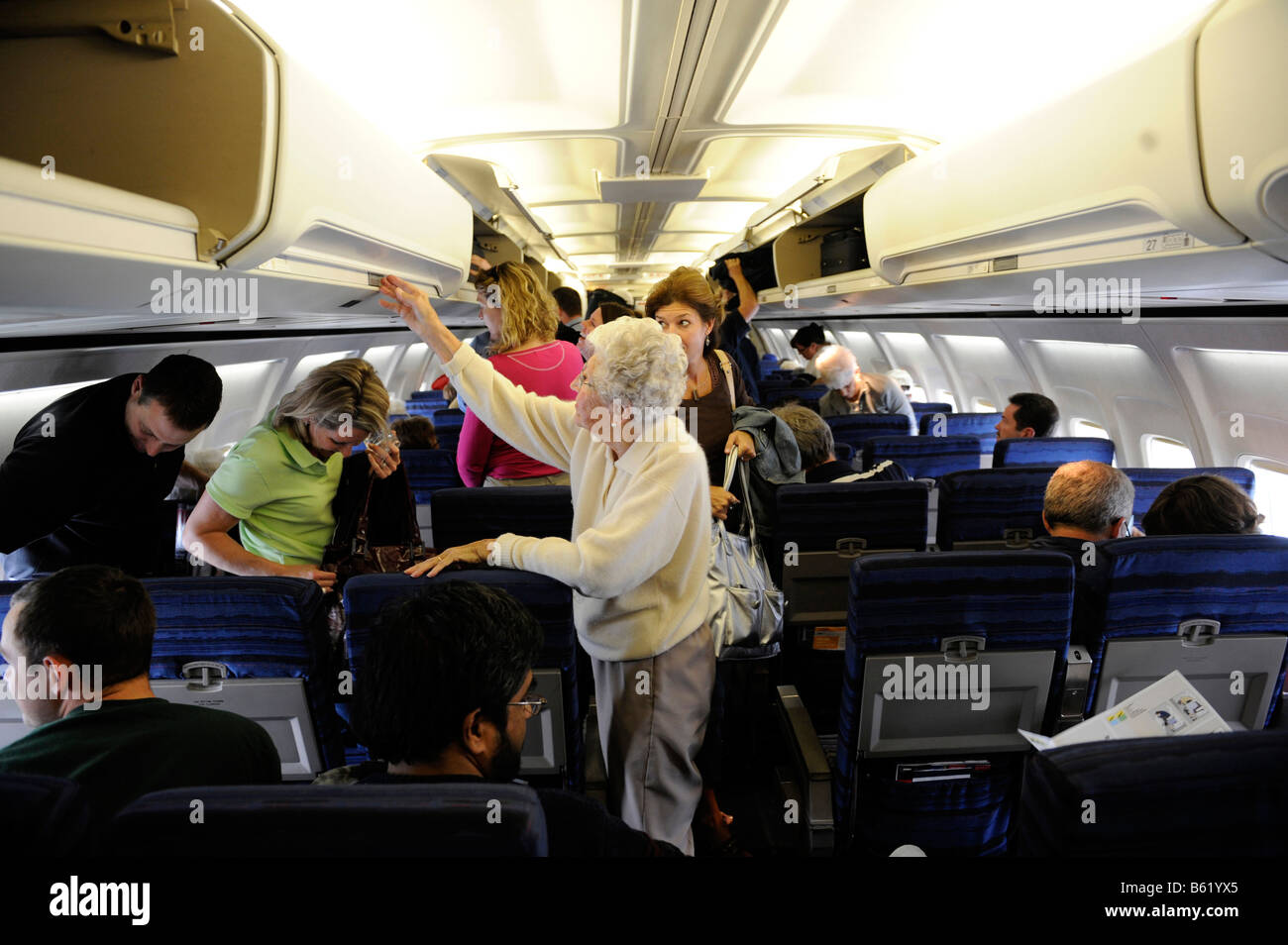 Airplane passengers hi-res stock photography and images - Alamy