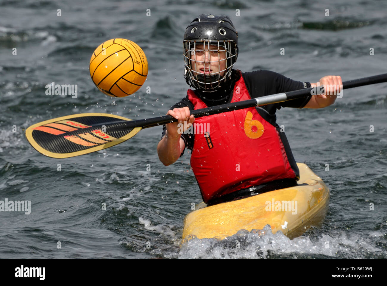 Canoe Polo player with posession of the ball, Canoe Polo Tournament