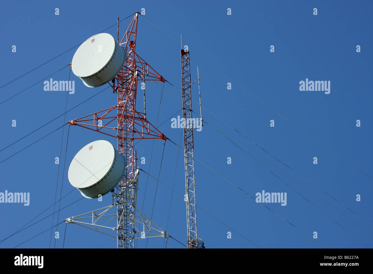 Guidewires bracing a communications tower Stock Photo Alamy