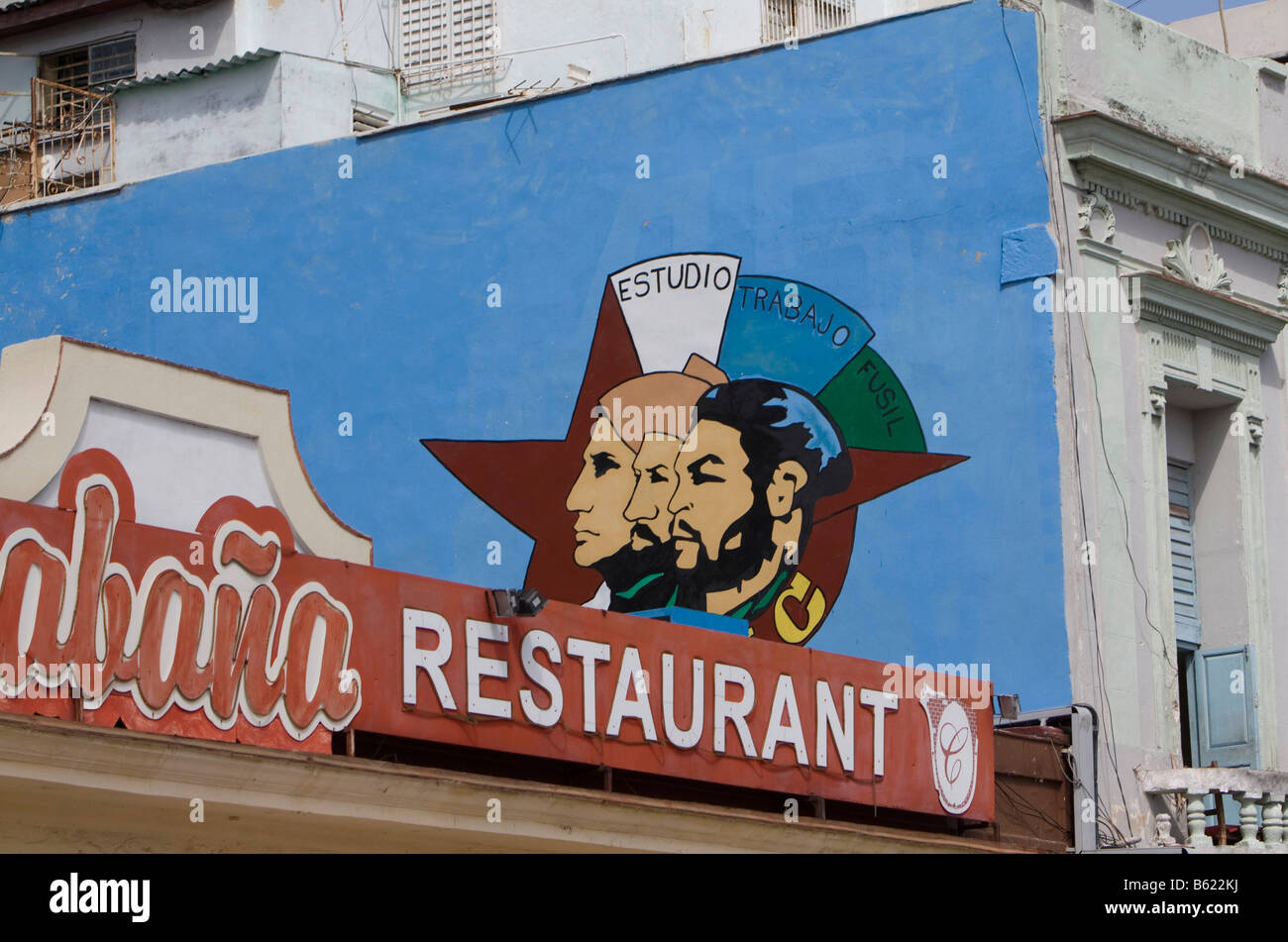 House painted with revolutionaries above a restaurant, historic district of Havana, Cuba, Caribbean Stock Photo