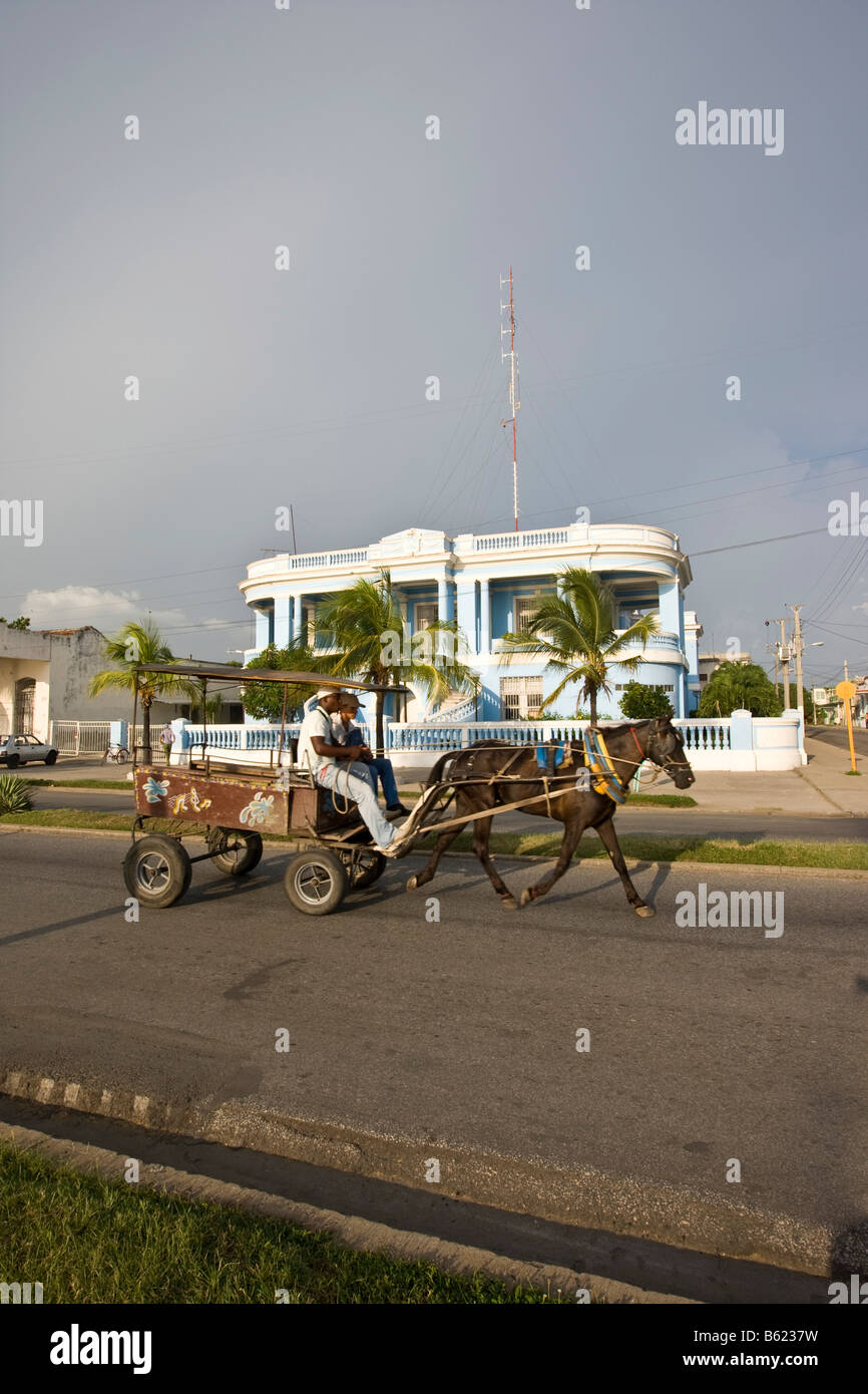 Horse and carriage in front of a historic building in Cienfuegos, Cuba, Caribbean, America Stock Photo