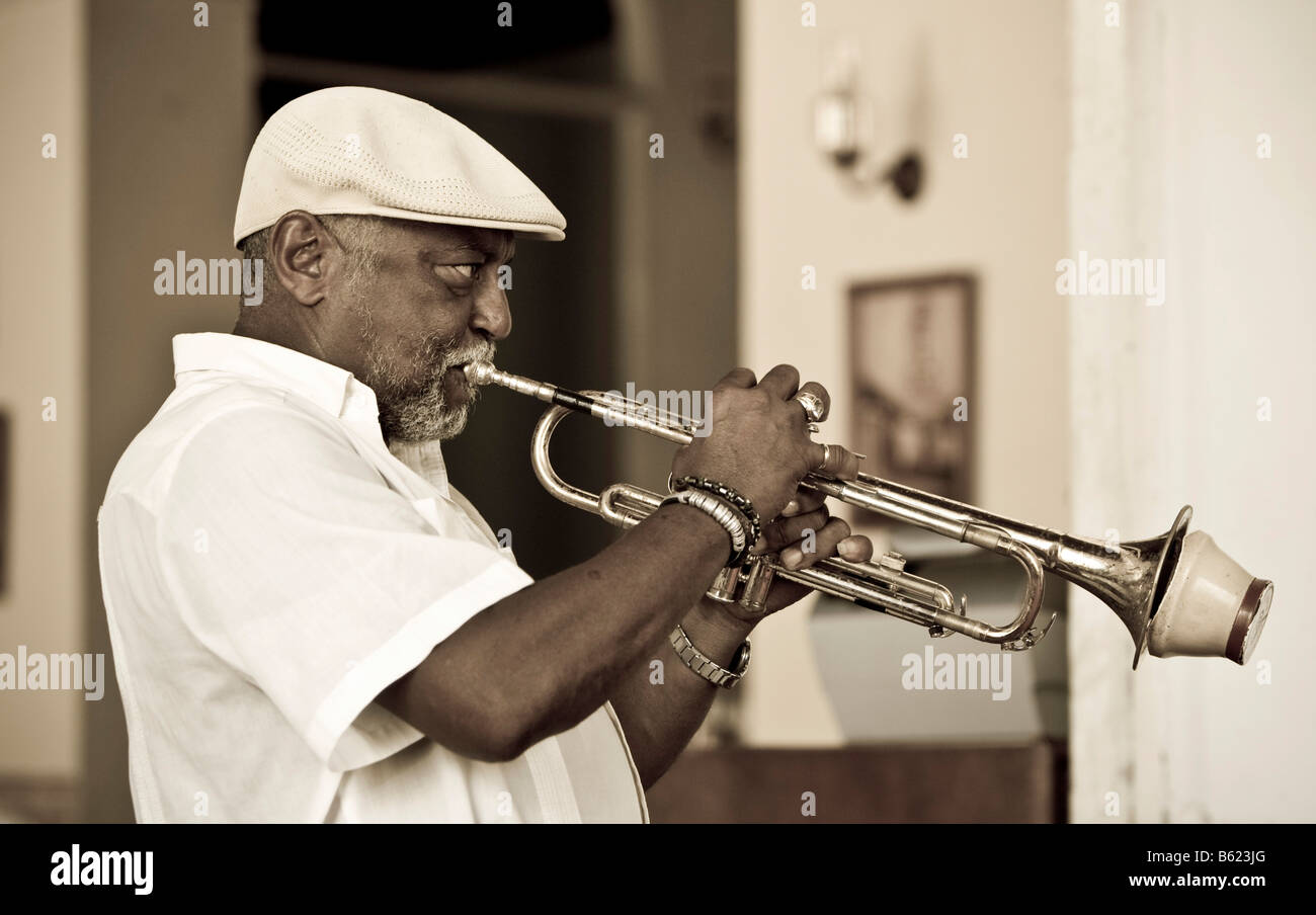 Cuban jazz musician playing in a restaurant, Plaza Mayor, Trinidad