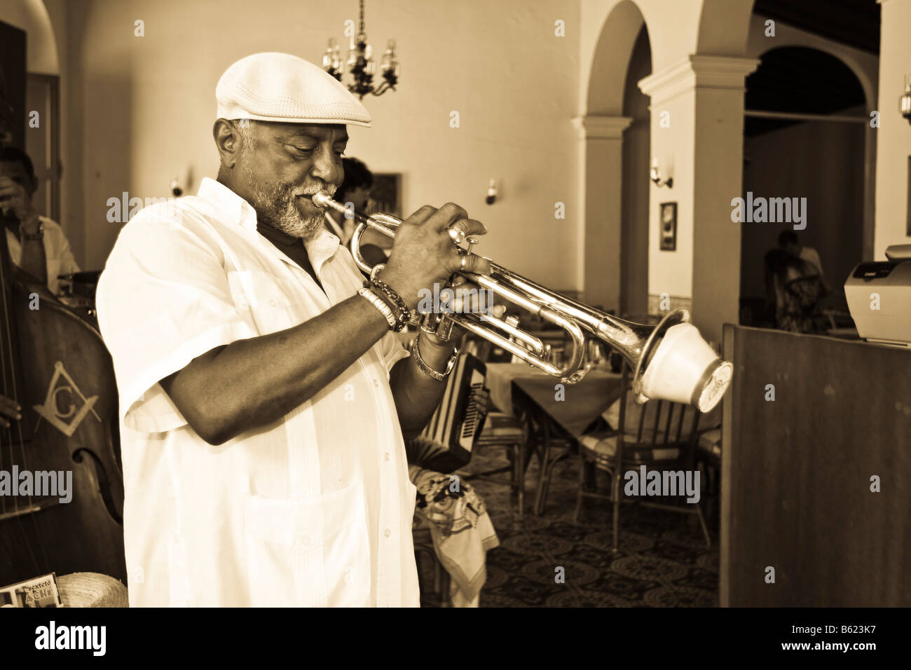 Cuban jazz musician playing in a restaurant, Plaza Mayor, Trinidad