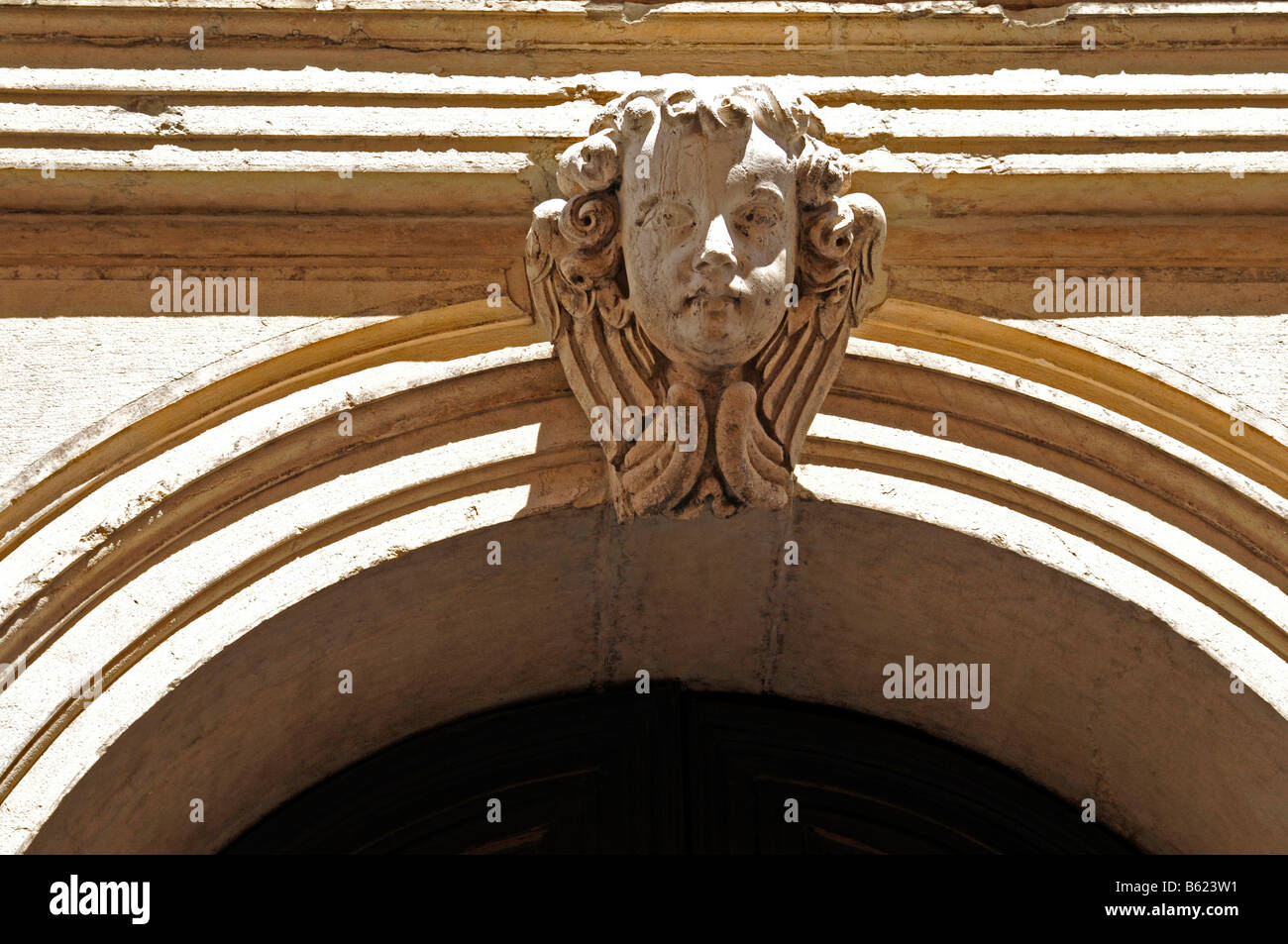 Stone head, detail of an archway, Venice, Italy, Europe Stock Photo