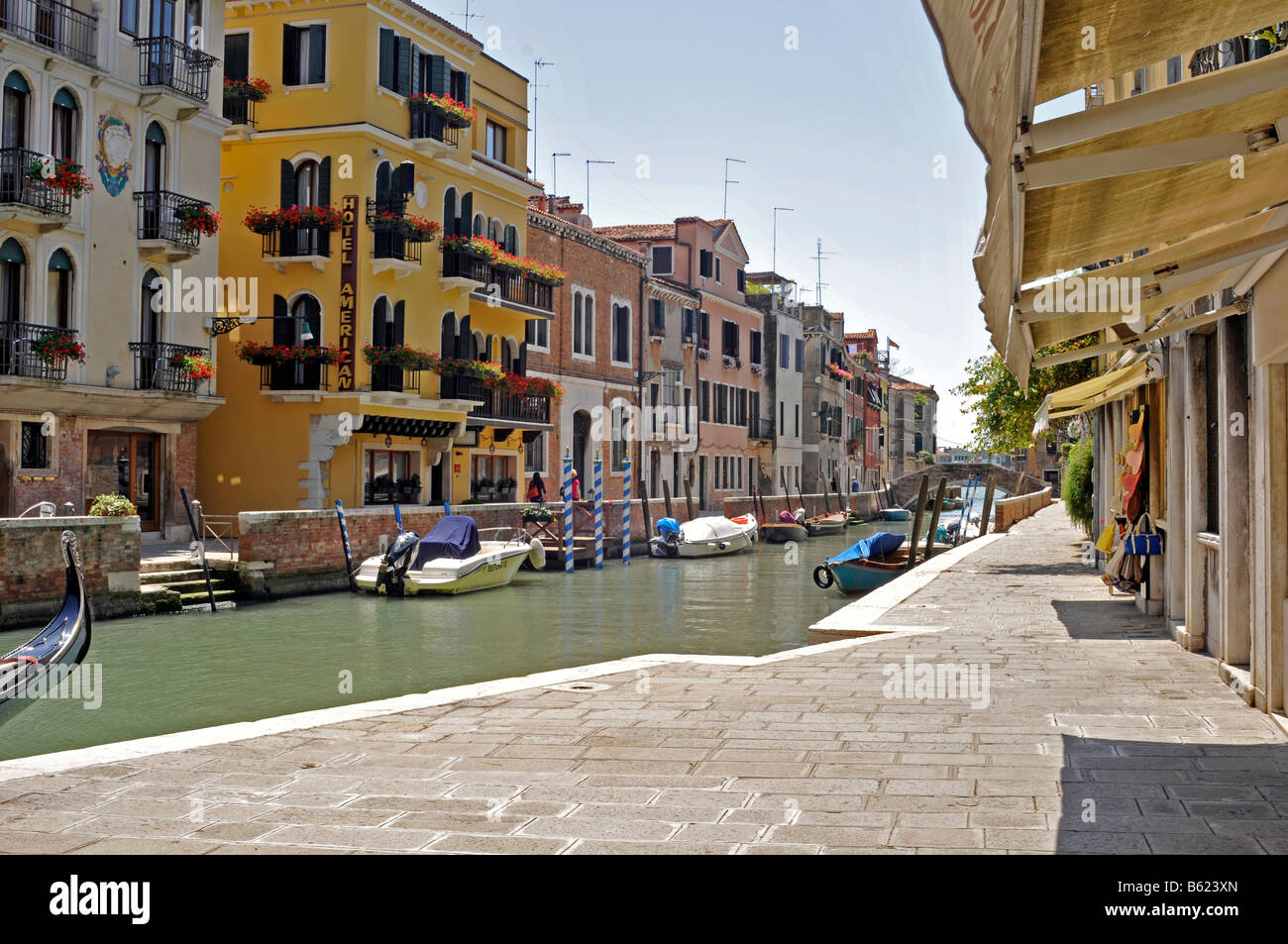 Dorsoduro street view with canal, Venice, Italy, Europe Stock Photo