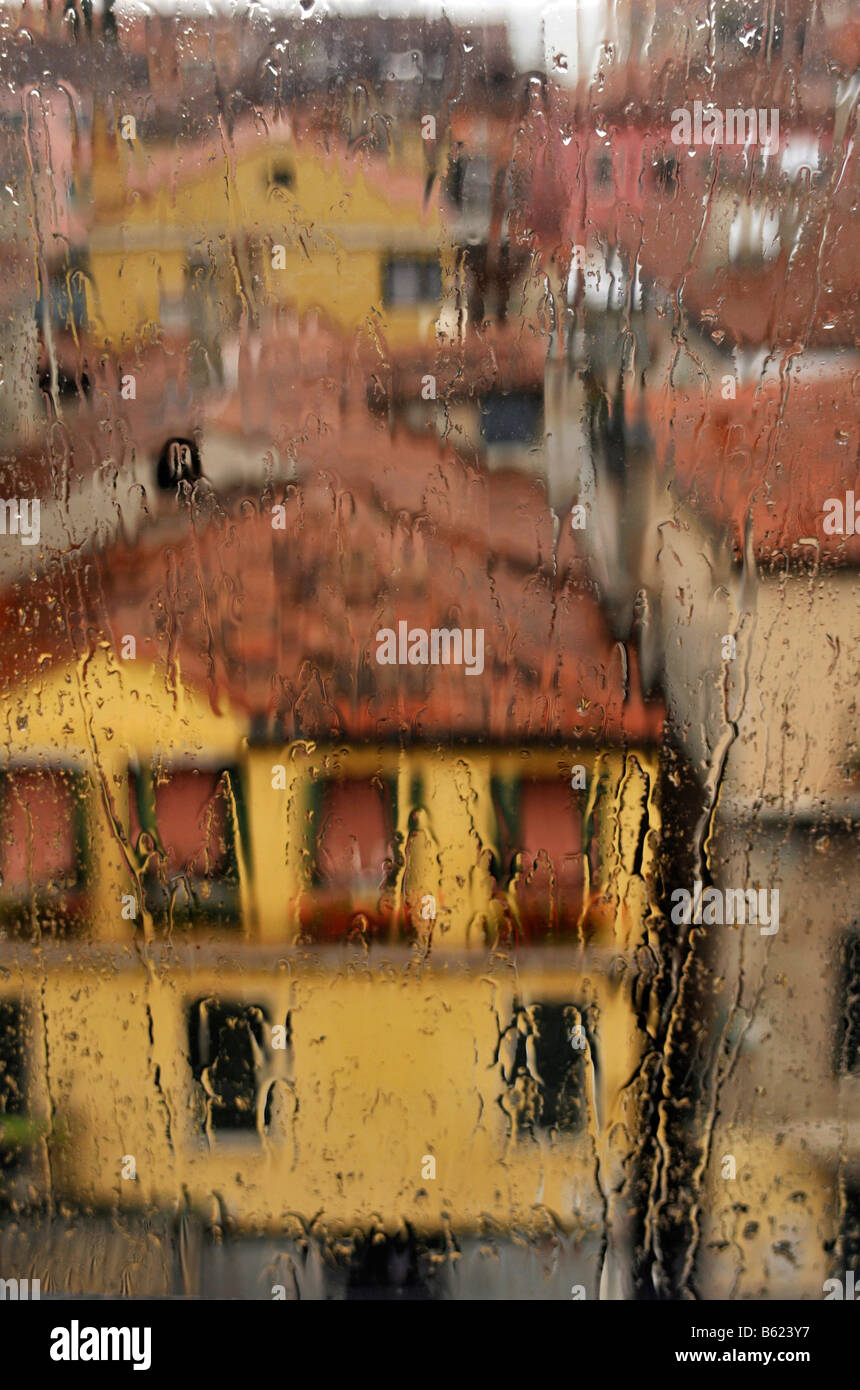 View of houses through a window with rain drops, Venice, Italy, Europe Stock Photo