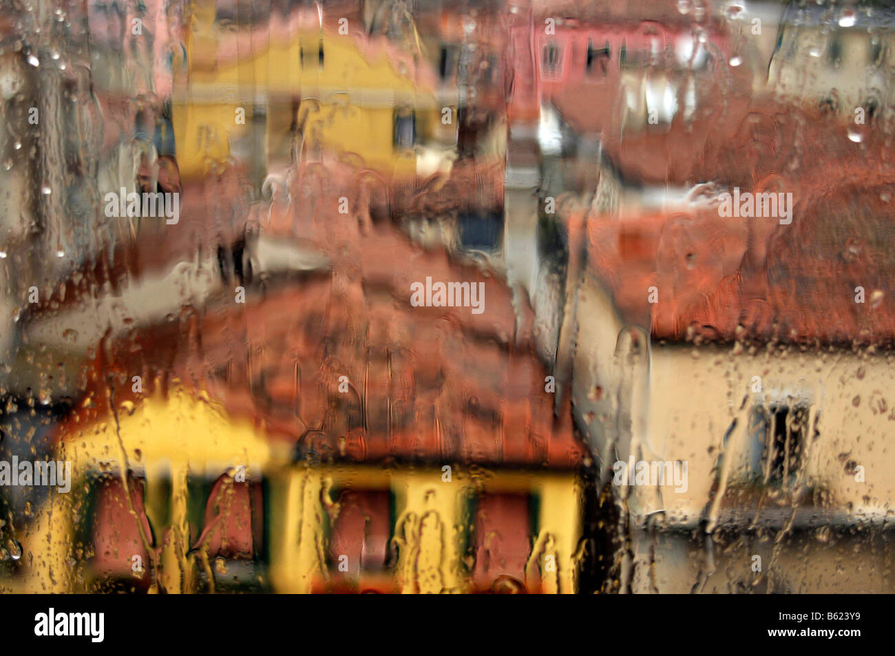 View of houses through a window with rain drops, Venice, Italy, Europe Stock Photo