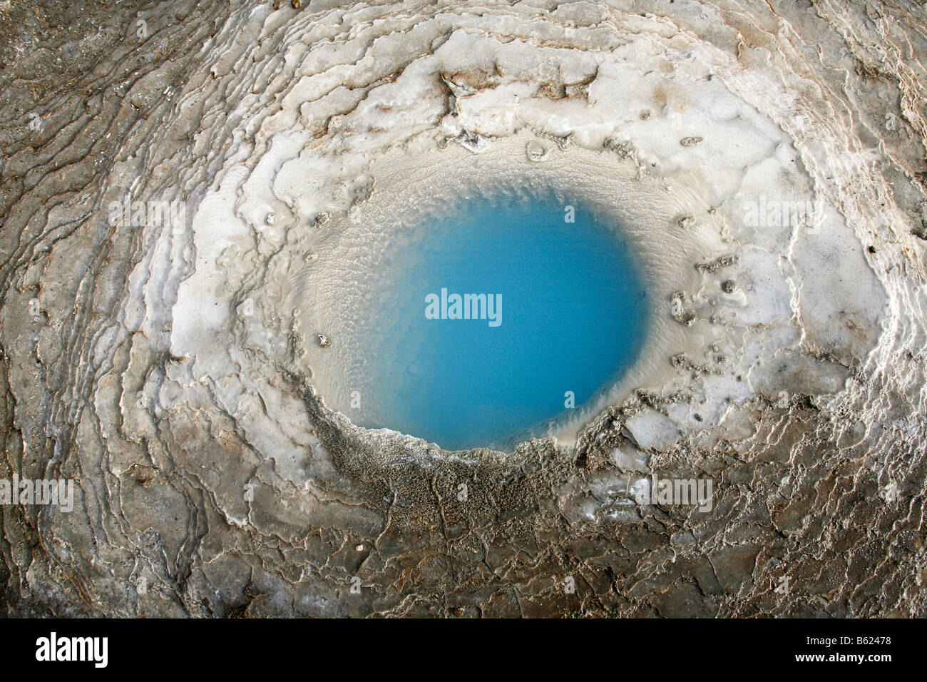 Blue hot water basin on a calcsinter terrace called Meyrarauga, girl's eye, Geothermal region