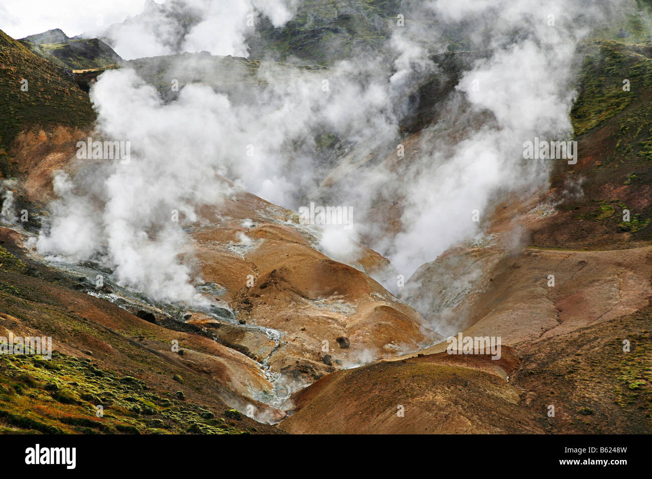 Steaming hot springs in the geothermal region on Hengill volcano near the geothermal power station of Nesjavellir in southern I Stock Photo