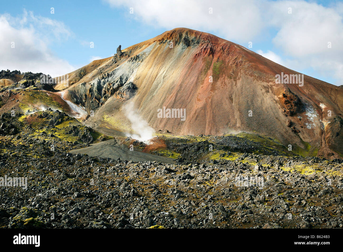 The colourful Mount Brennisteinsalda, coloured by minerals, sulphur wave, surrounded by a lava field, Landmannalaugar, Iceland, Stock Photo