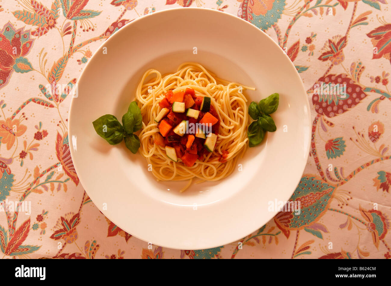 Spaghetti with fresh vegetables Stock Photo