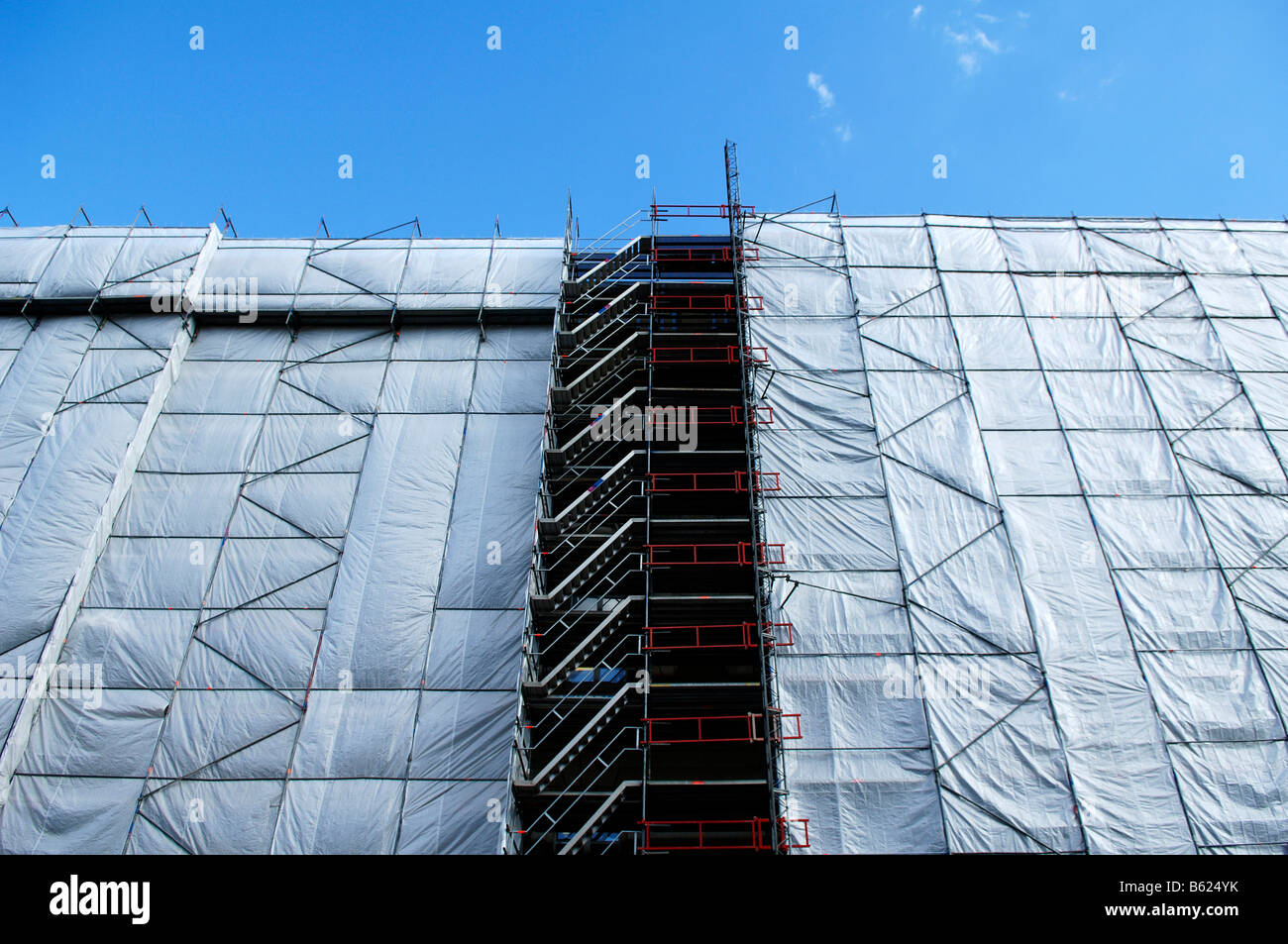 Scaffolded building hung with a tarpaulin, Berlin, Germany, Europe Stock Photo