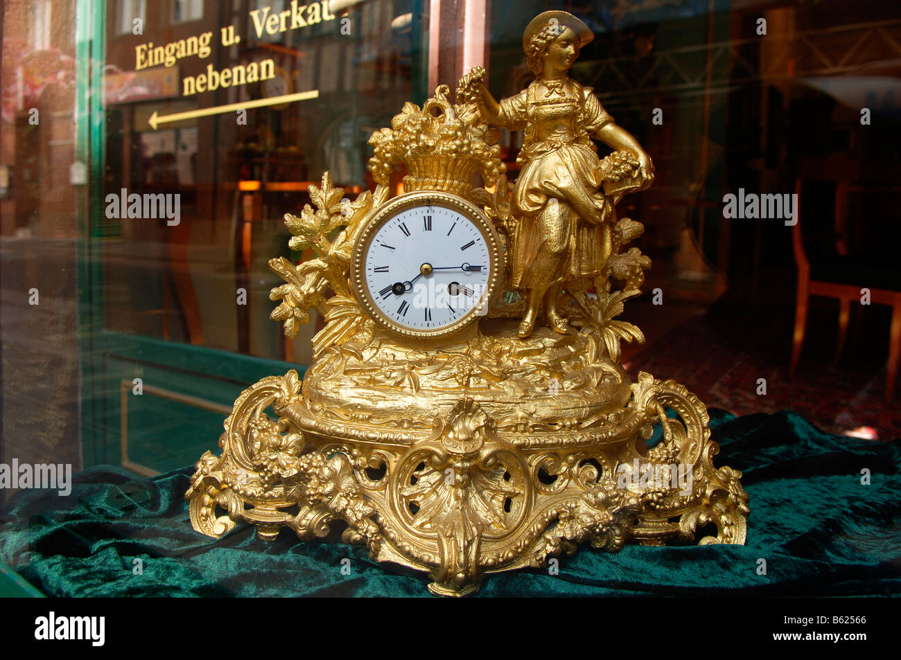 Old table clock in an antique shop, Nuremberg, Middle Franconia, Bavaria, Germany, Europe Stock Photo
