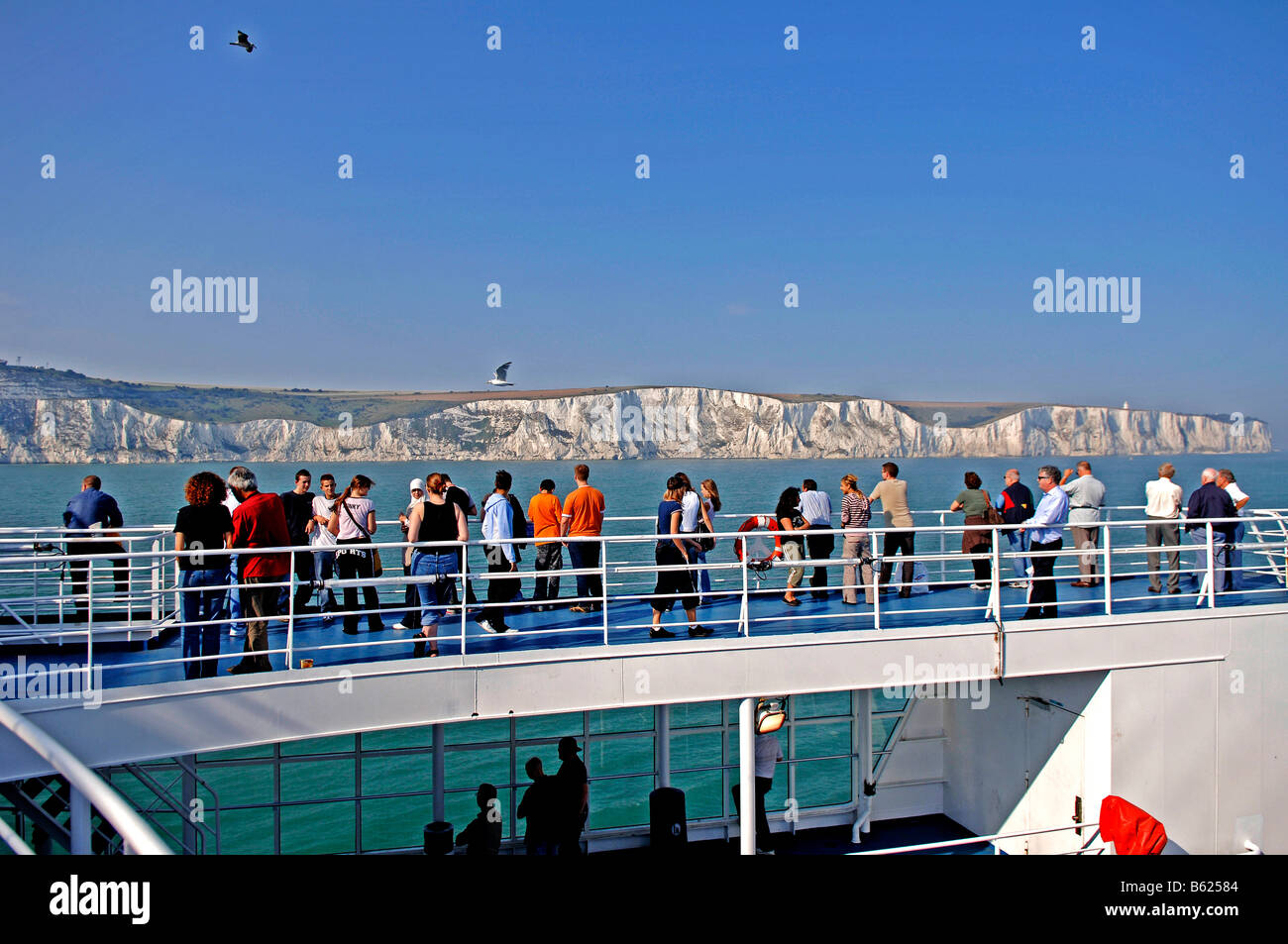 Passengers on a ferry viewing the white cliffs of Dover, Dover, England, Great Britain, Europe Stock Photo
