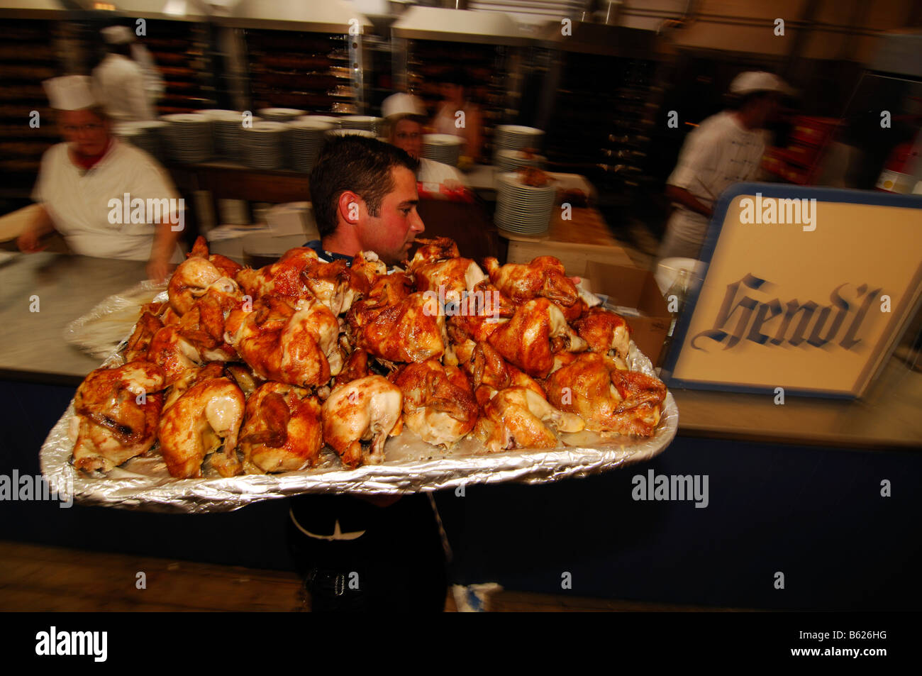 Waiter with roast chicken, Wies'n, October fest, Munich, Bavaria, Germany, Europe Stock Photo