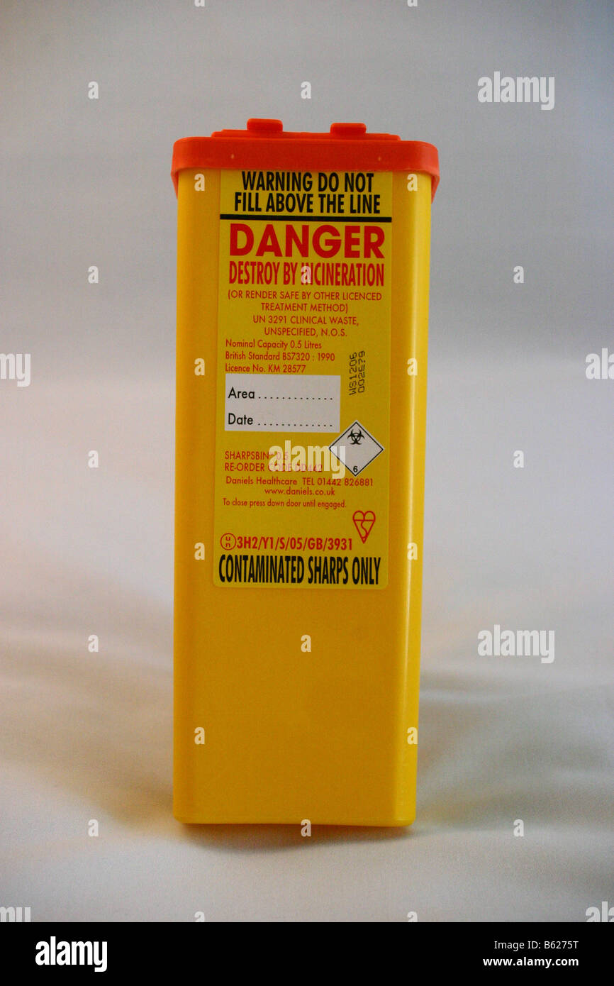 Sharps box used for disposing of used needles Stock Photo Alamy