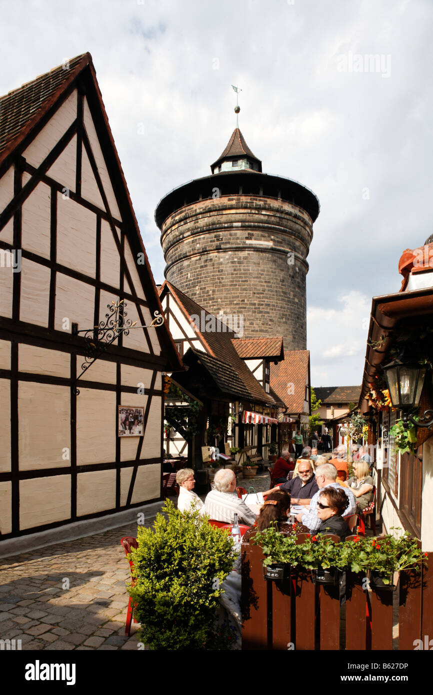 Handwerkerhof, Frankonian wine bar, half-timbered houses, fortified tower, historic city centre, Nuremberg, Middle Franconia, B Stock Photo