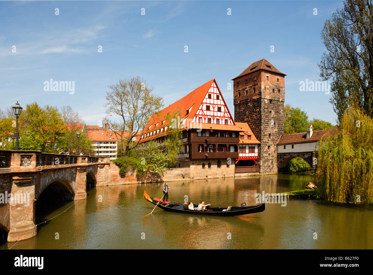 Maxbruecke Bridge, Weinstadel, hangman´s flat above the Pegnitz River, venetian gondola, historic city centre, Nuremberg, Middl Stock Photo