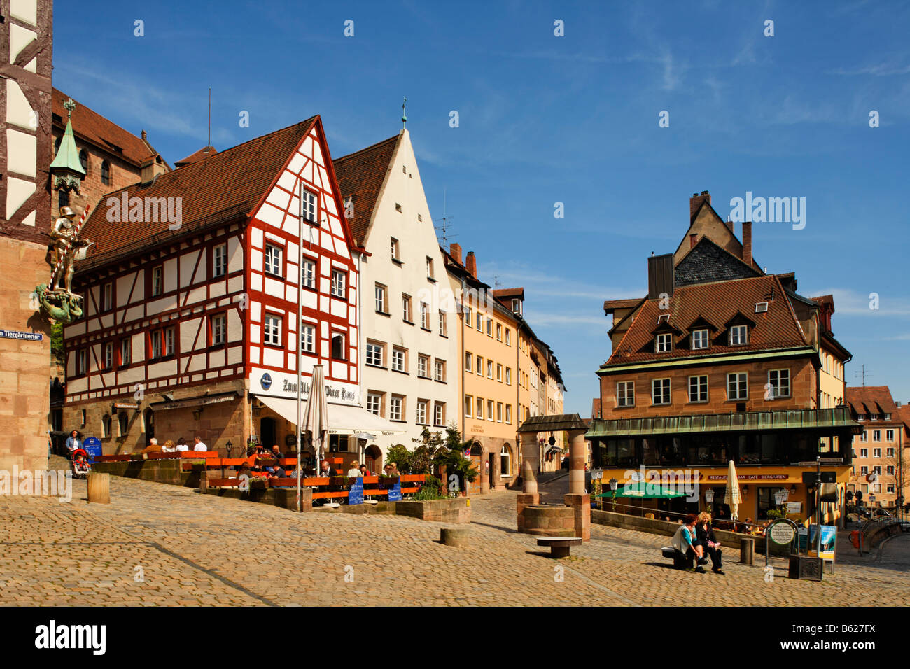 By the Tiegaertnertor Tower, fountain, restaurants, historic city centre, Nuremberg, Middle Franconia, Bavaria, Germany, Europe Stock Photo