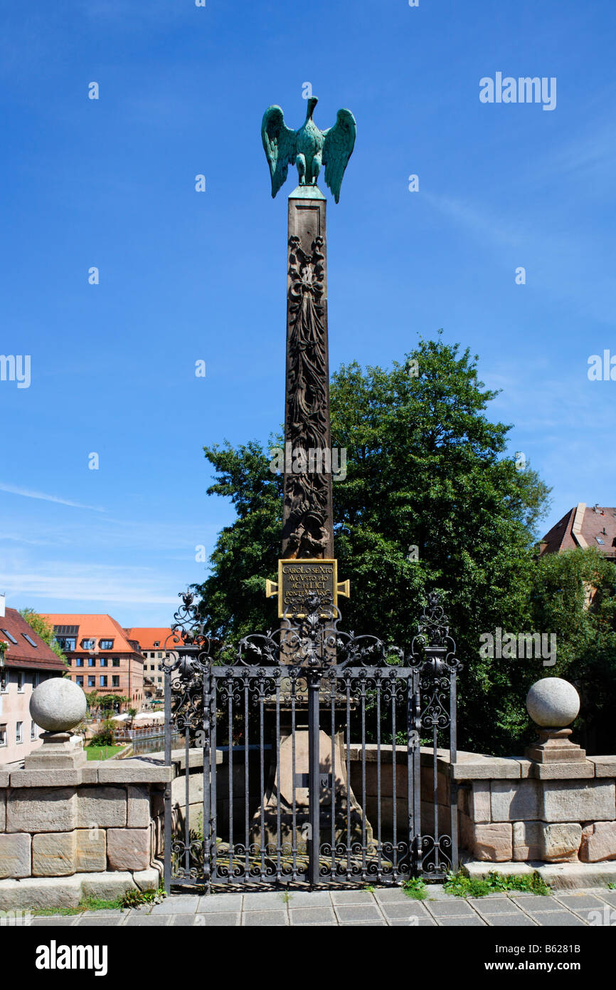 Peace symbol, dove on a baroque obelisk, cast iron railings, Obere Karlsbruecke Bridge, historic city centre, Nuremberg, Middle Stock Photo