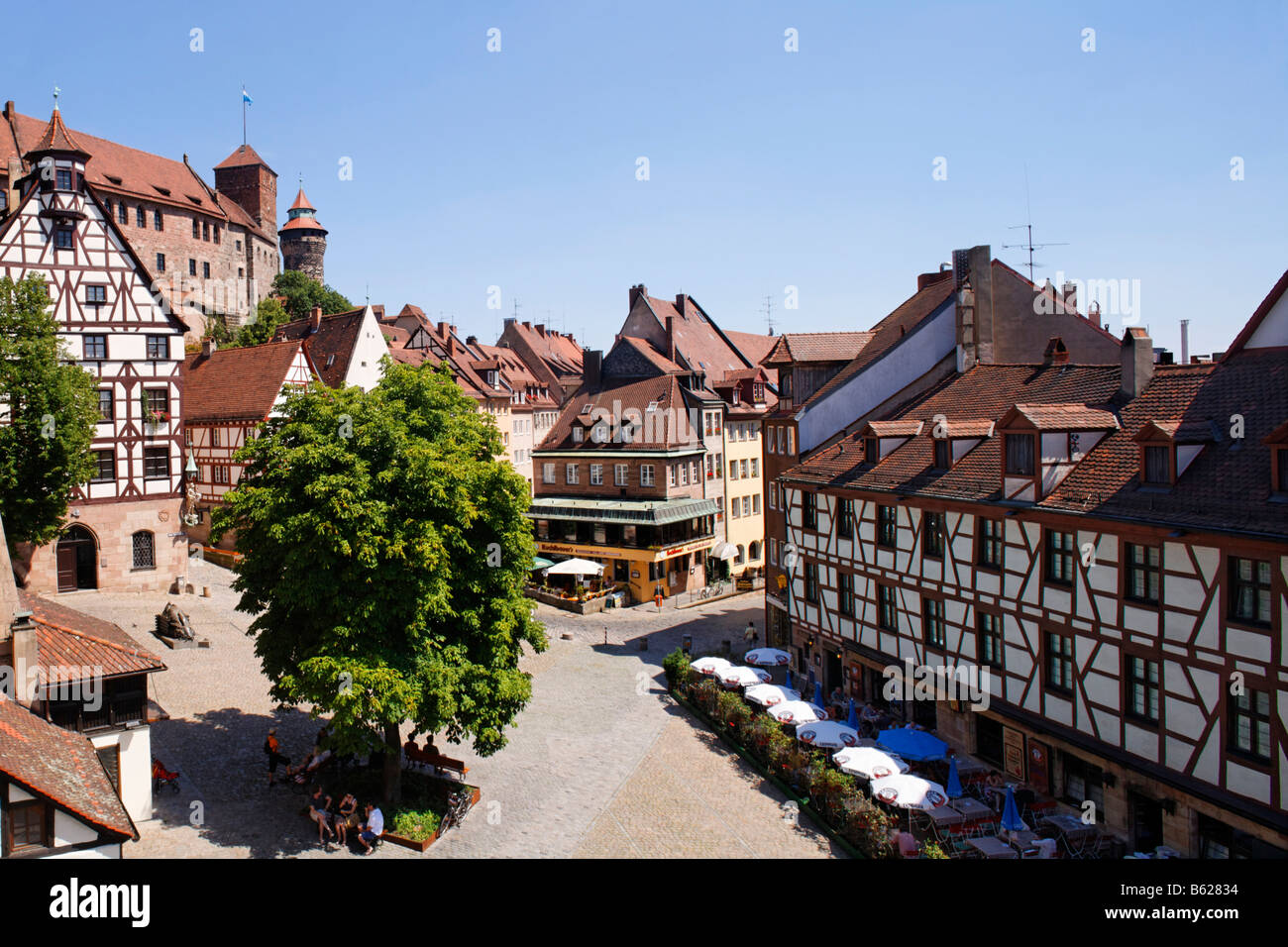 Square at the zoo entrance, Nuremberg Castle or Kaiserburg, Heidenturm Tower, Sinnwellturm Tower, Chestnut tree, half-timbered  Stock Photo