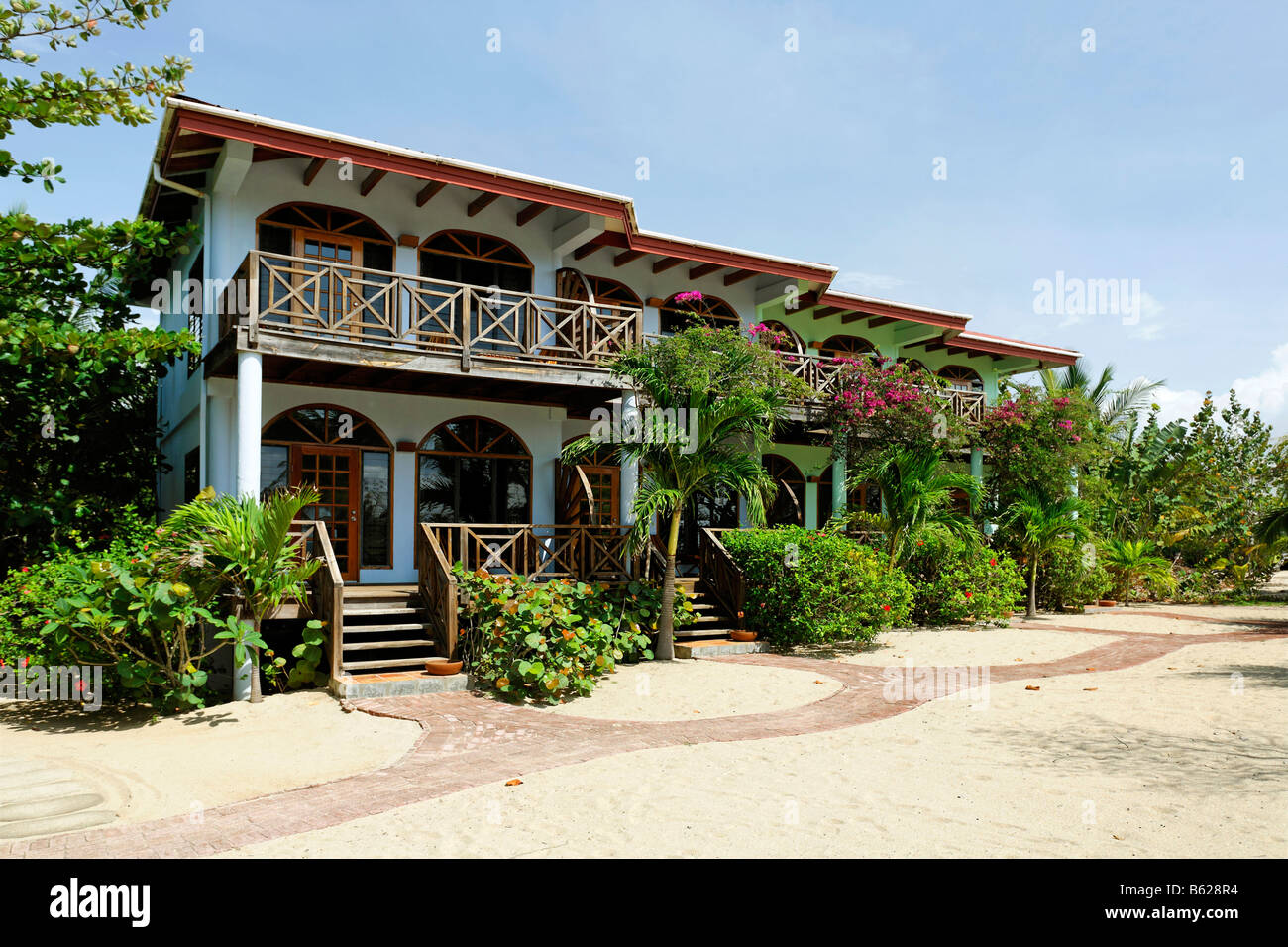 Row of bungalows, Hamanasi Hotel, Hopkins, Dangria, Belize, Central America, Caribbean Stock Photo