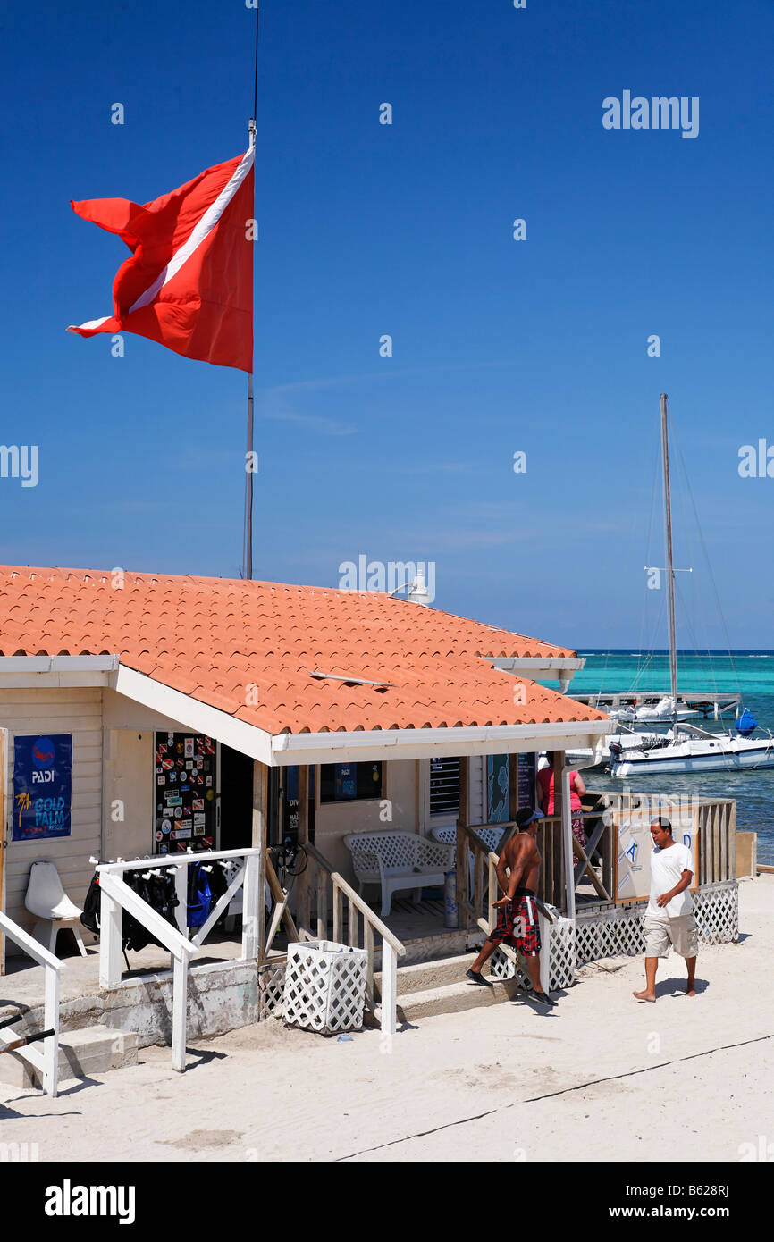 Diving flag over the scuba diving center at the Sun Breeze Hotel, San Pedro, Ambergris Cay Island, Belize, Central America, Car Stock Photo