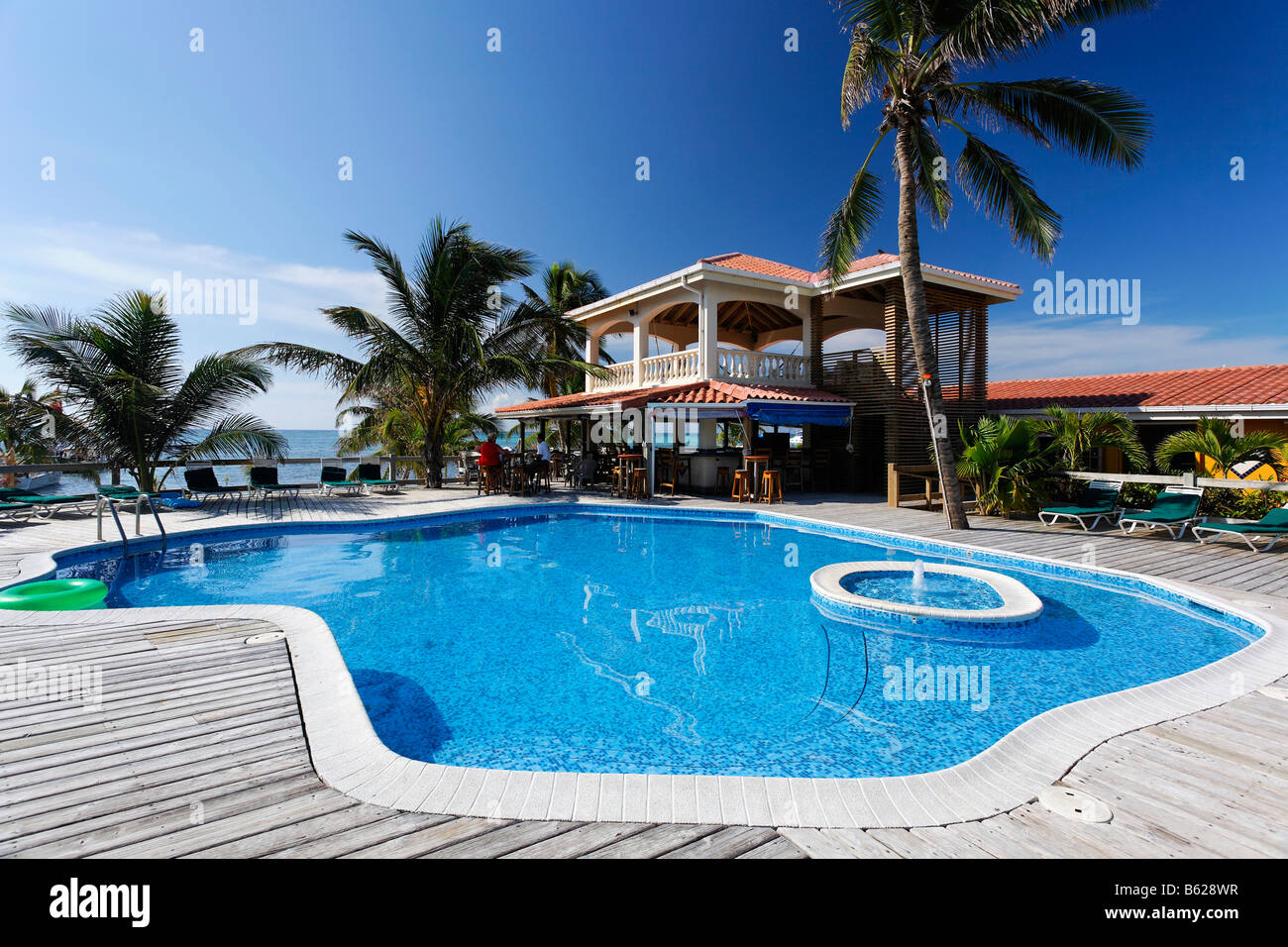 Swimming pool and restaurant of the Sun Breeze Hotel, San Pedro, Ambergris Cay Island, Belize, Central America, Caribbean Stock Photo