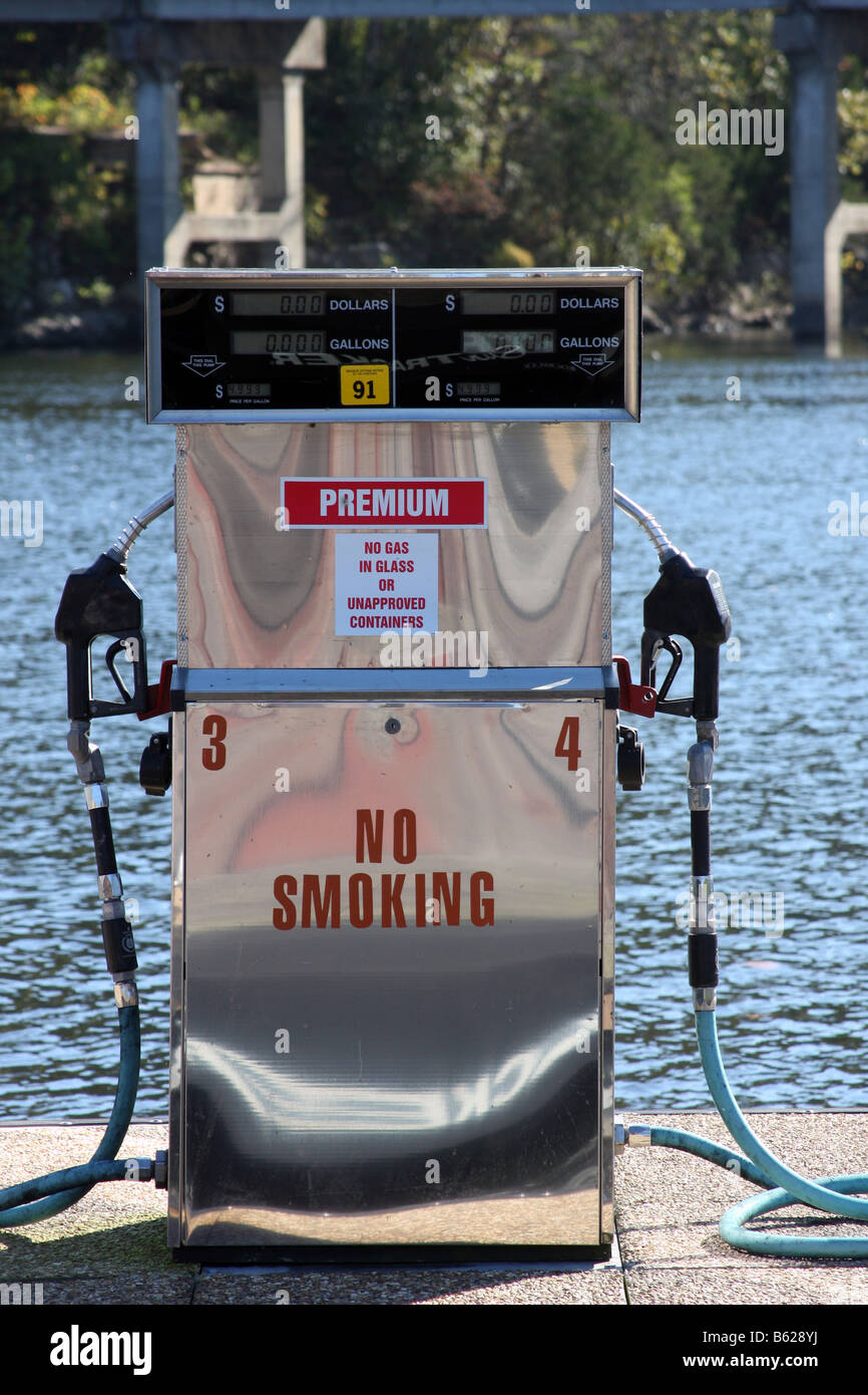 A gas pump on the pier of the White River Branson Missouri Stock Photo