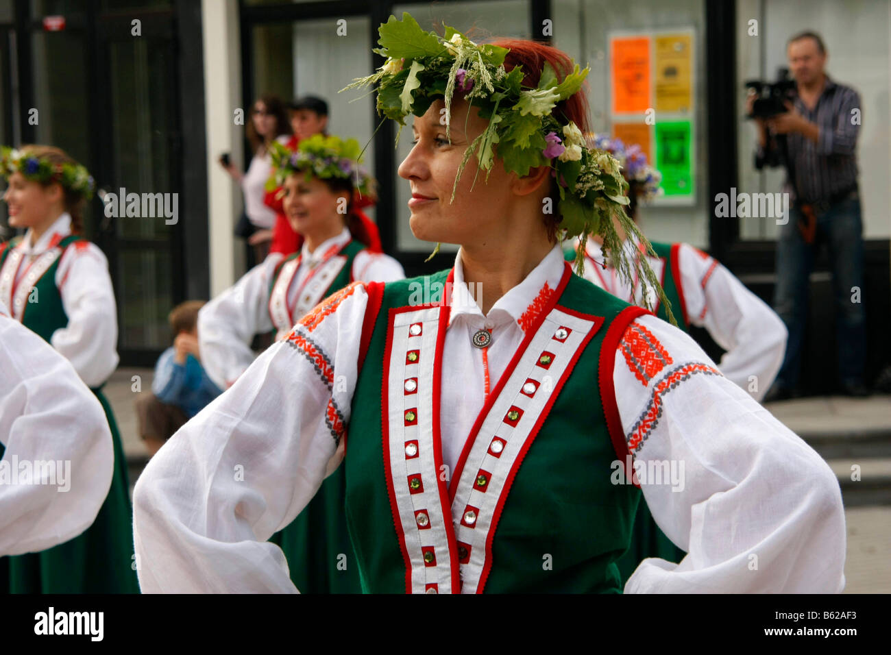 Folklore group in traditional costume dancing at the mid-summer festival in Jurmala, Latvia, Baltic Countries Stock Photo