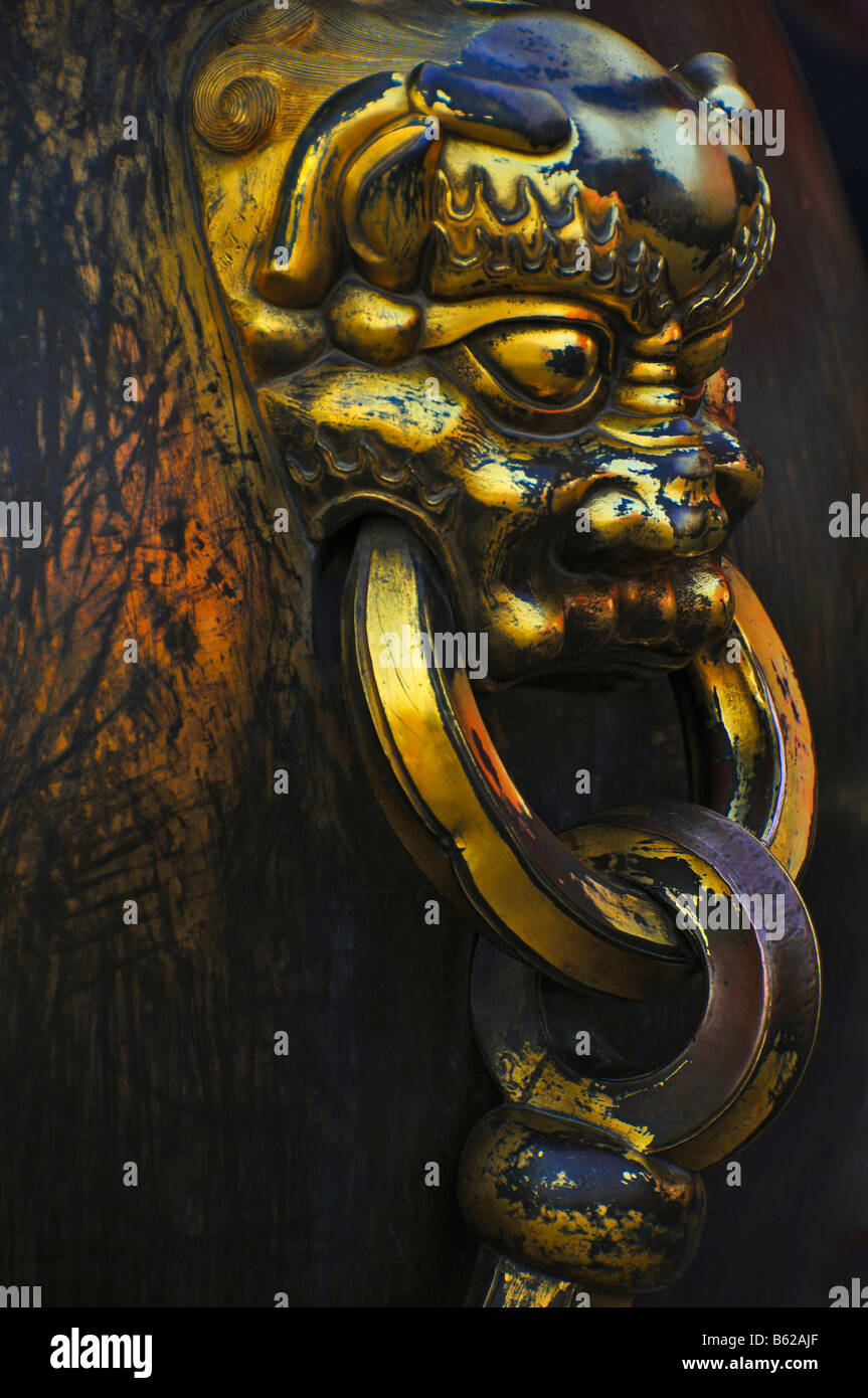 Oriental Symbolic Decorative Handle on a pot in the Forbidden city Beijing China Stock Photo