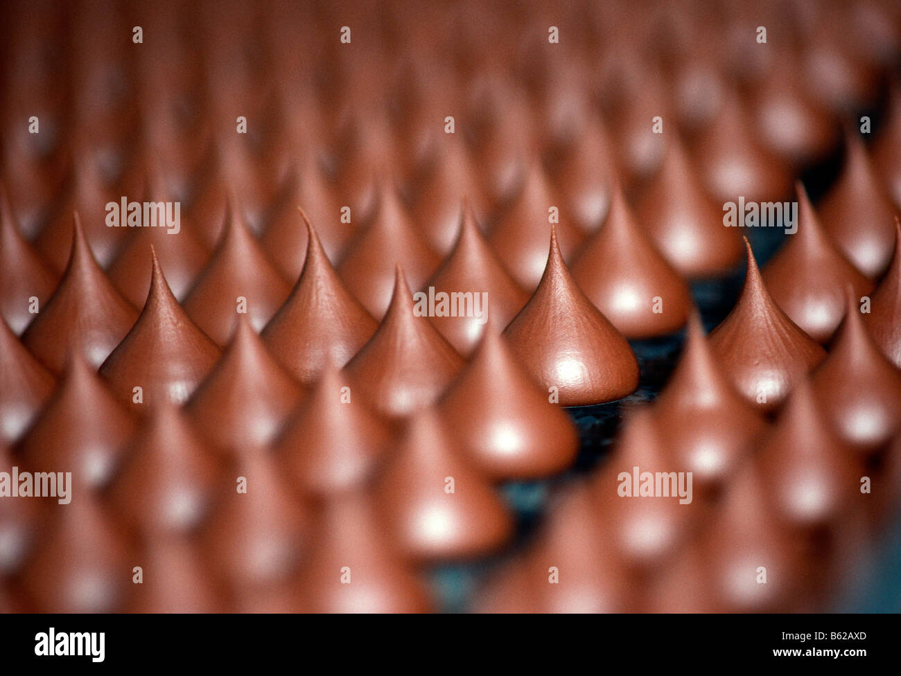 Close up of Hershey chocolate kisses on the production line, Hershey