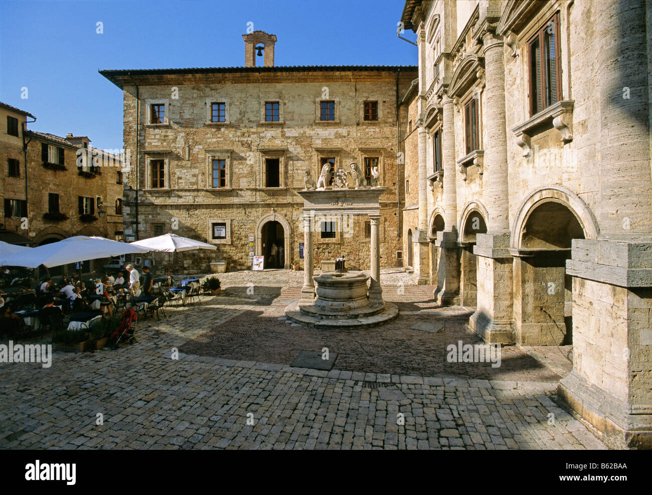 Street cafe, Palazzo del Capitano del Popolo, fountain, Palazzo Tarugi ...