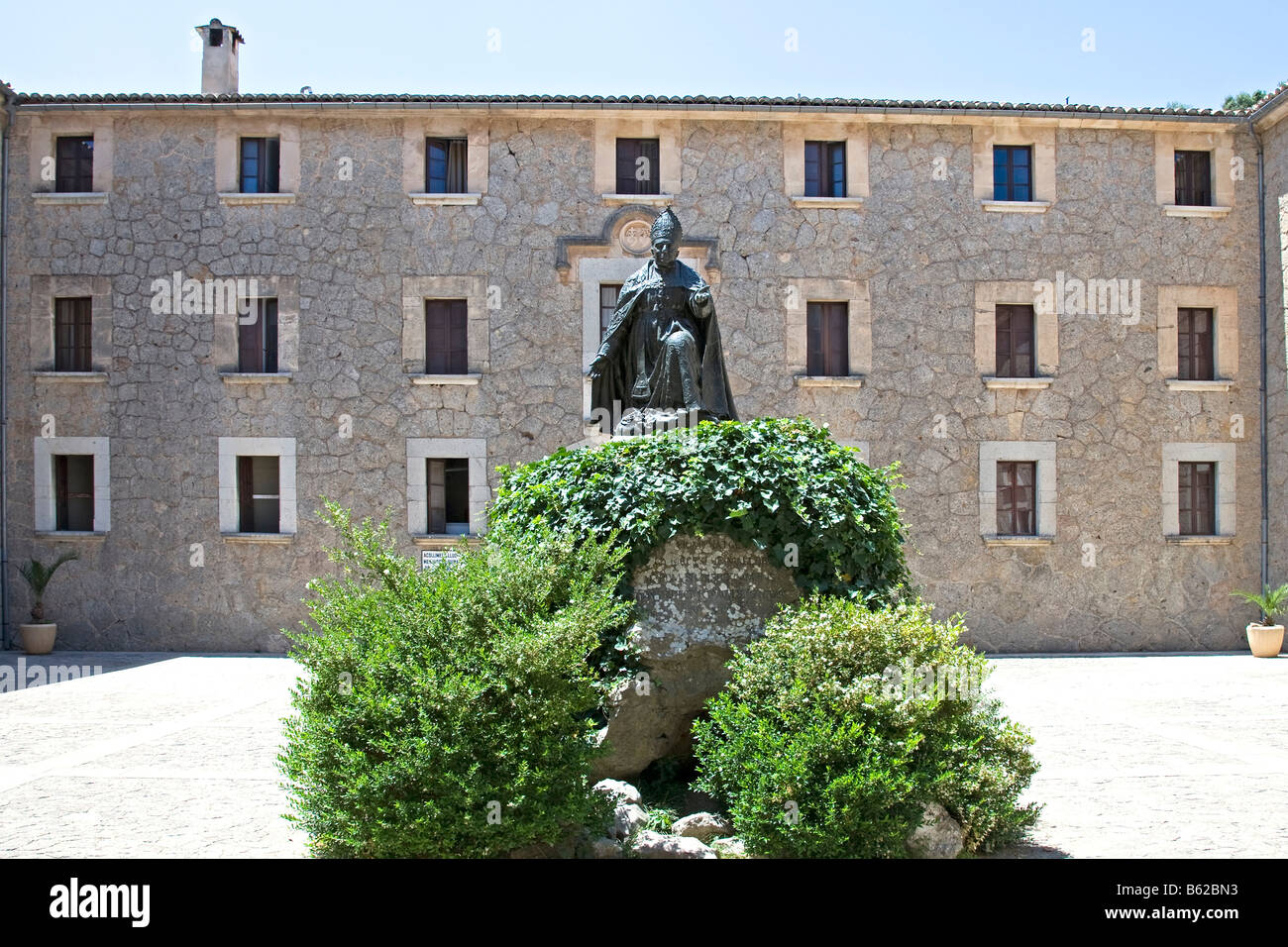 Memorial to the bishop Pere-Joan Campins in the cloistered courtyard of the Santuario de lluc Monastery, county of Escorca in t Stock Photo